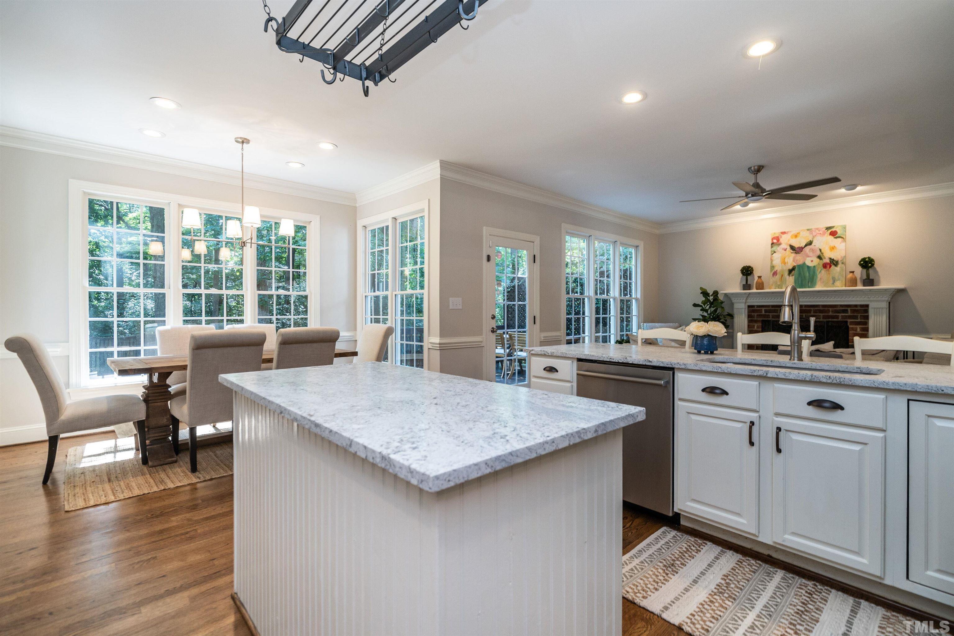 3016 Stone Gap Court Raleigh, NC 27612 - Photo 16 of 37 a kitchen with sink and view of living room