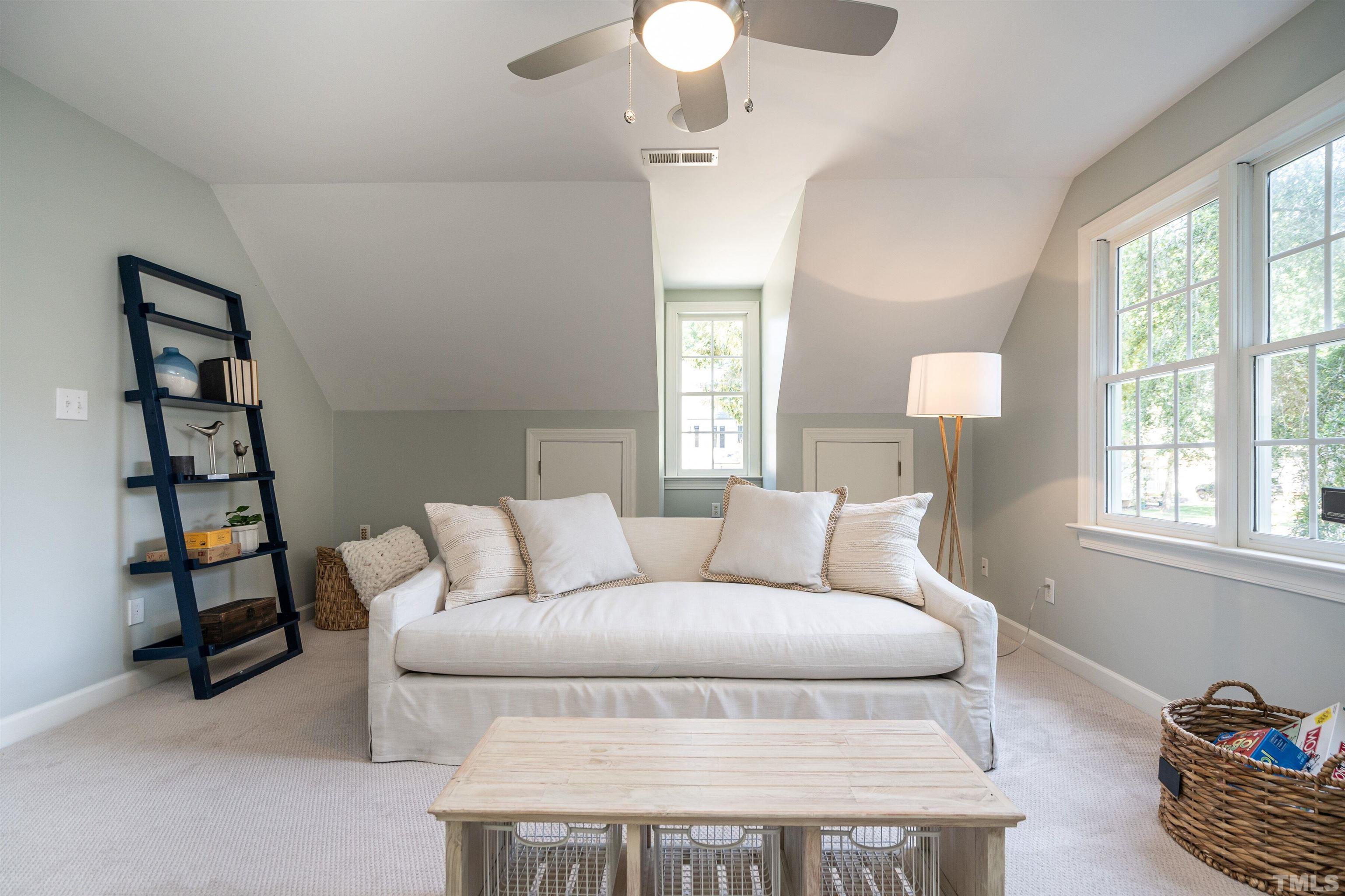 3016 Stone Gap Court Raleigh, NC 27612 - Photo 29 of 37 a living room with furniture and a window