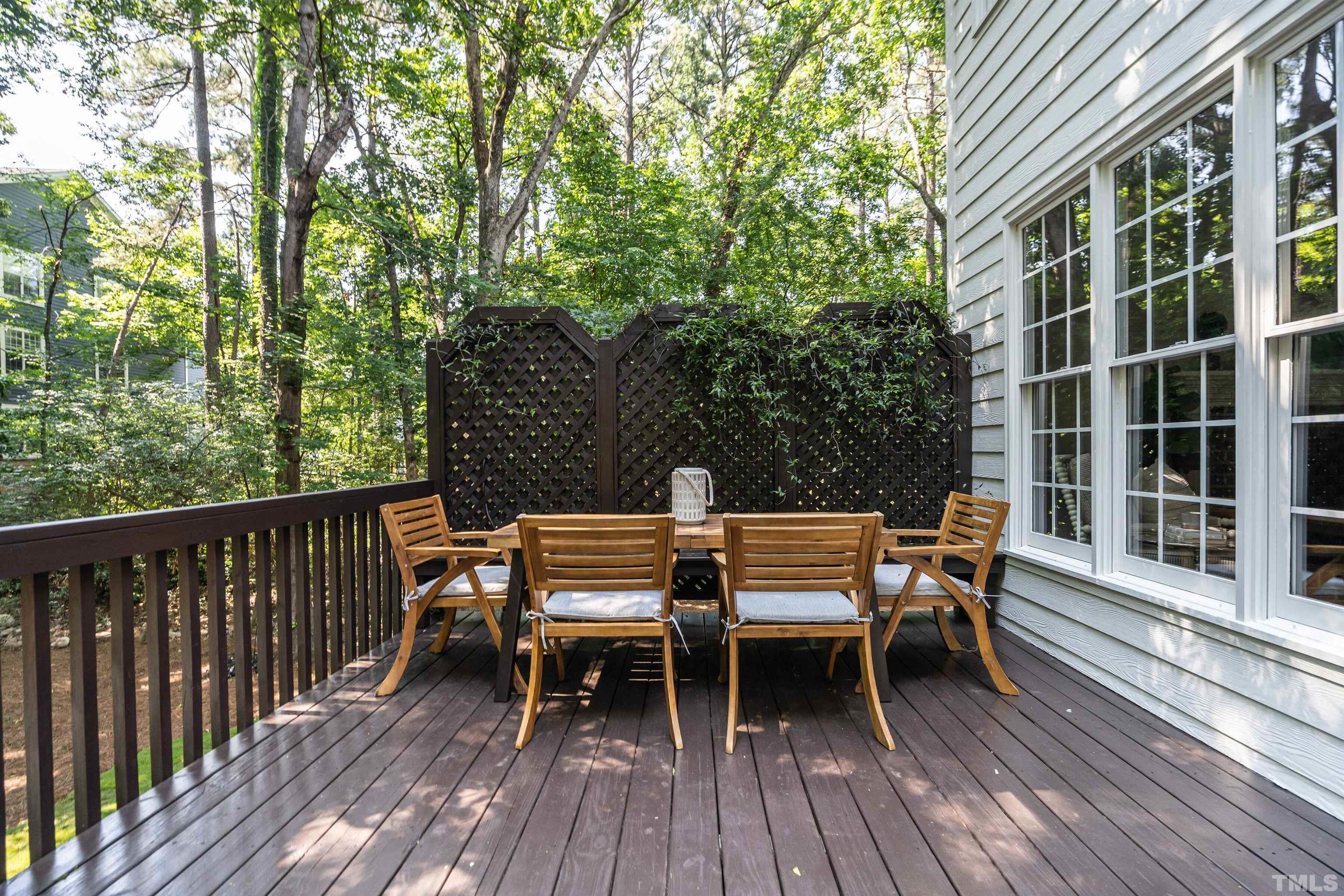 3016 Stone Gap Court Raleigh, NC 27612 - Photo 32 of 37 a wooden bench sitting at roof deck of house