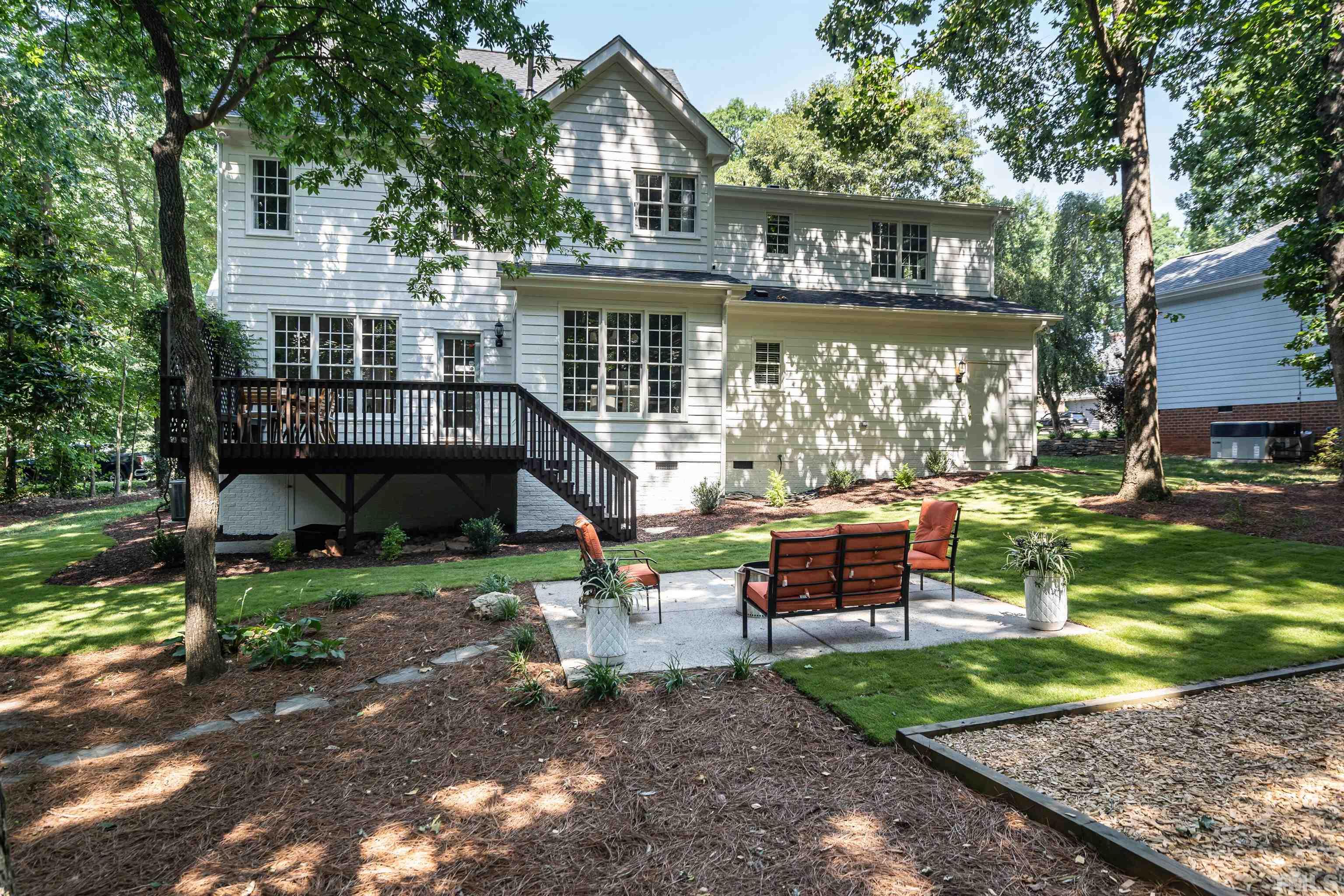 3016 Stone Gap Court Raleigh, NC 27612 - Photo 35 of 37 a front view of a house with garden