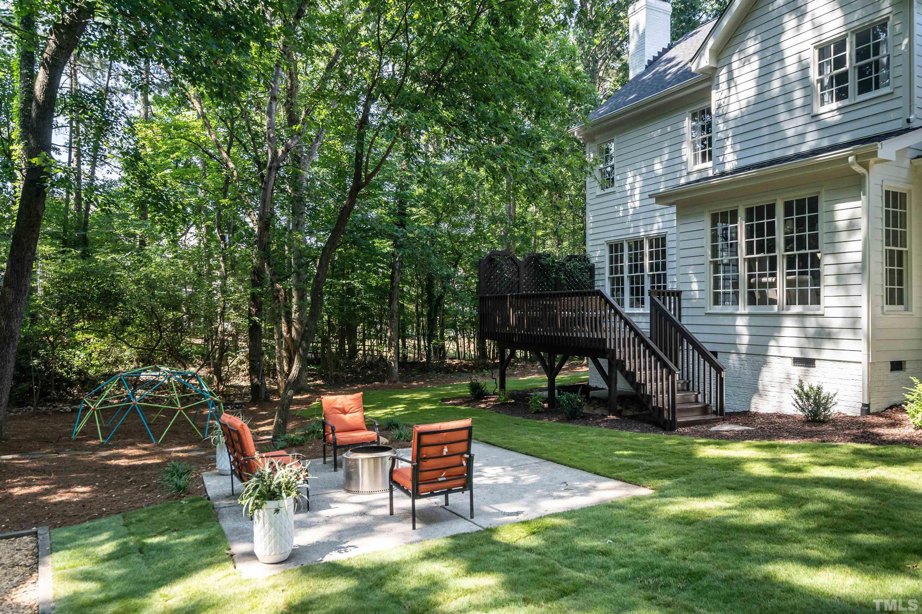3016 Stone Gap Court Raleigh, NC 27612 - Photo 36 of 37 a view of a backyard with sitting area