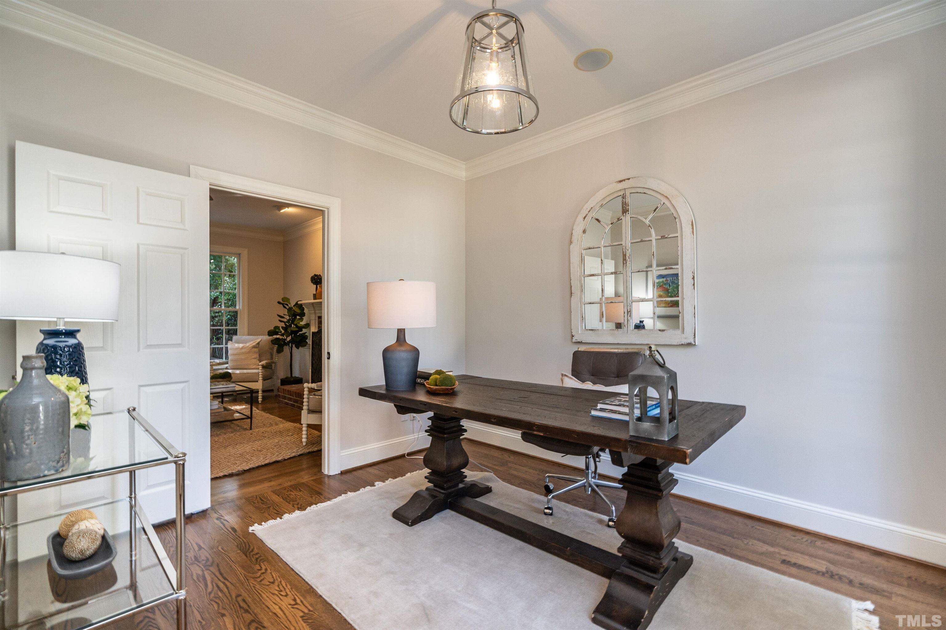 3016 Stone Gap Court Raleigh, NC 27612 - Photo 5 of 37 a room with furniture and wooden floor