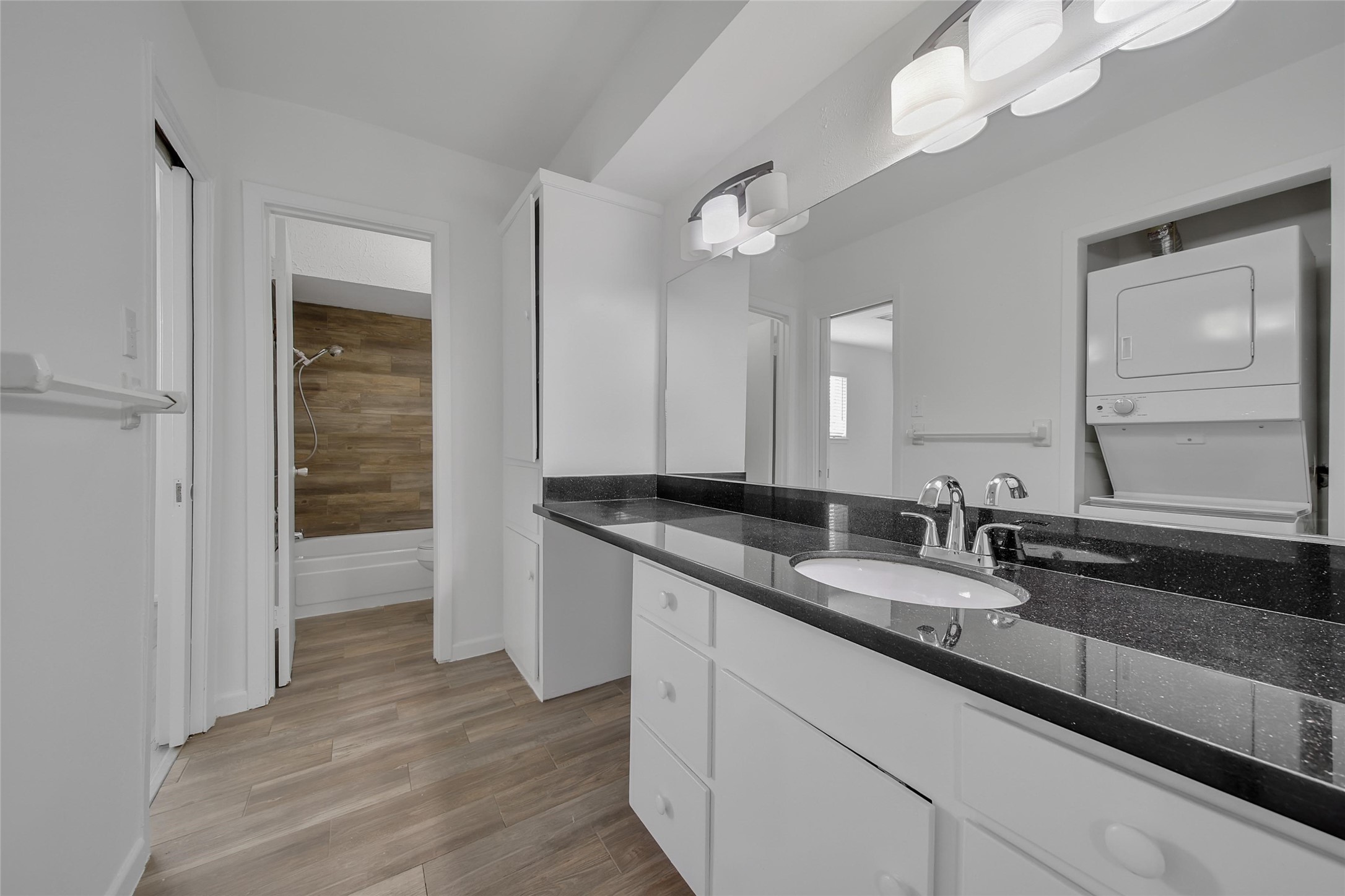 1403 Blalock Road, Unit 15 Houston, TX 77055 - Photo 12 of 21 a bathroom with a double vanity sink and a mirror