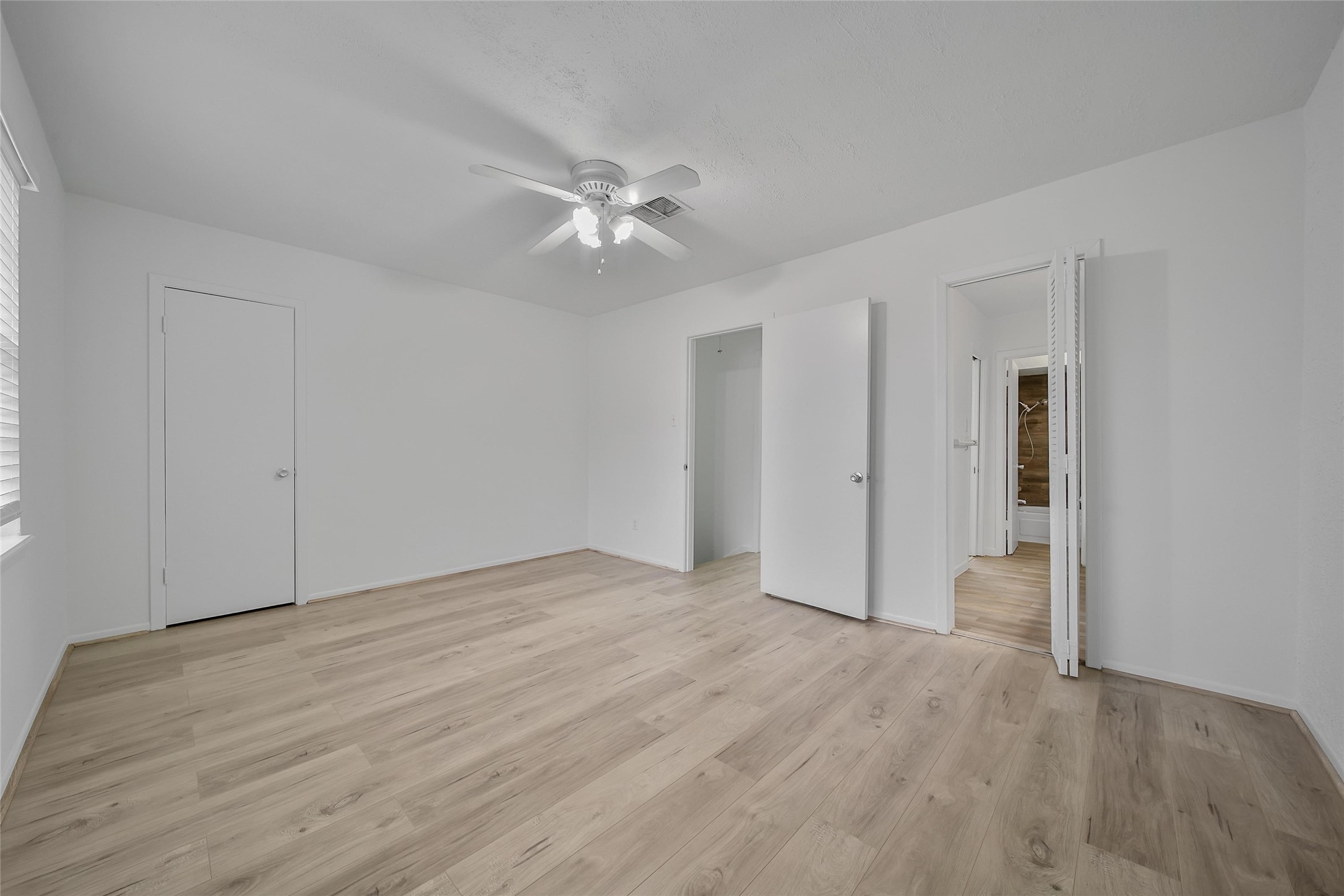1403 Blalock Road, Unit 15 Houston, TX 77055 - Photo 13 of 21 a view of empty room with wooden floor