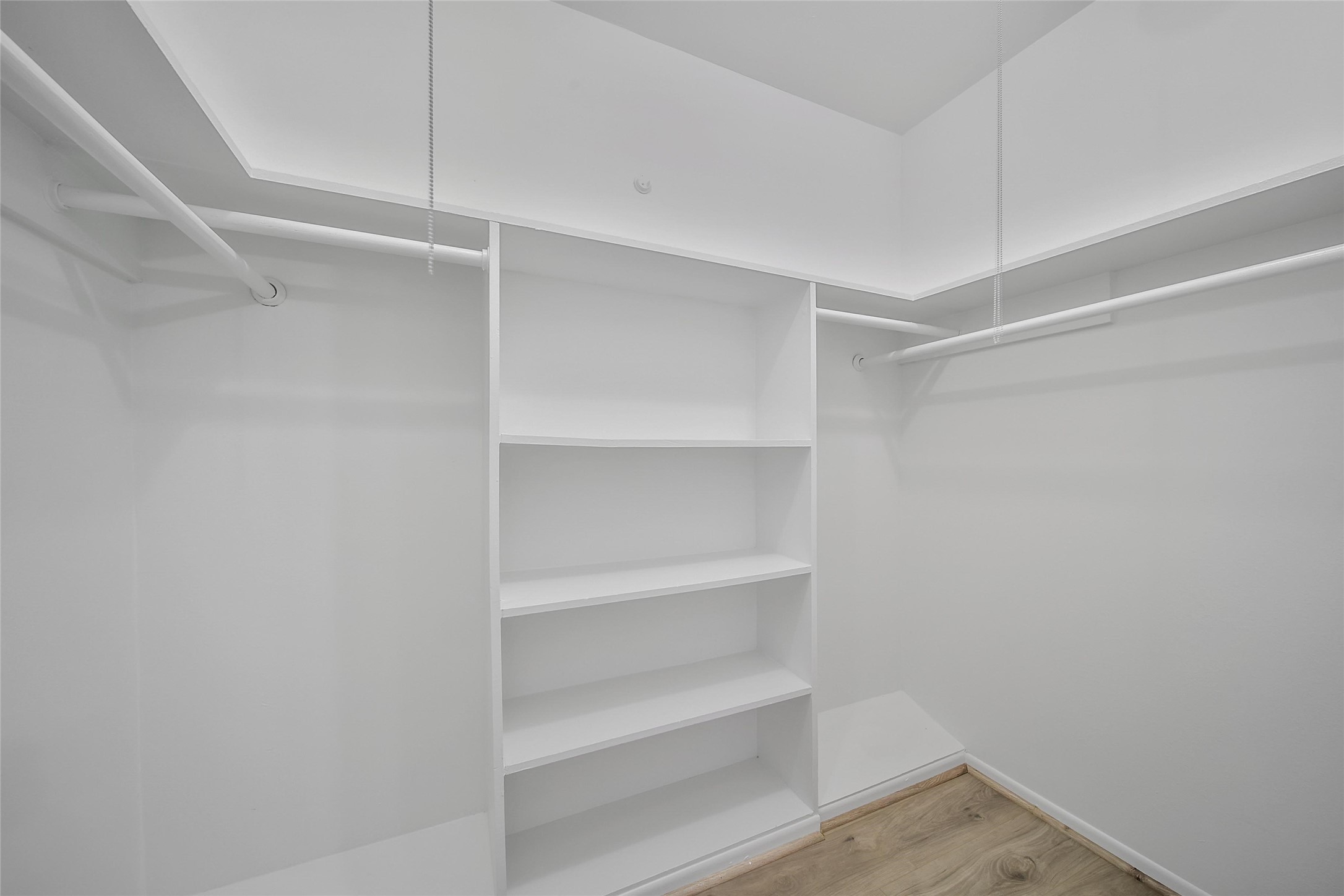 1403 Blalock Road, Unit 15 Houston, TX 77055 - Photo 14 of 21 a view of walk in closet with empty racks