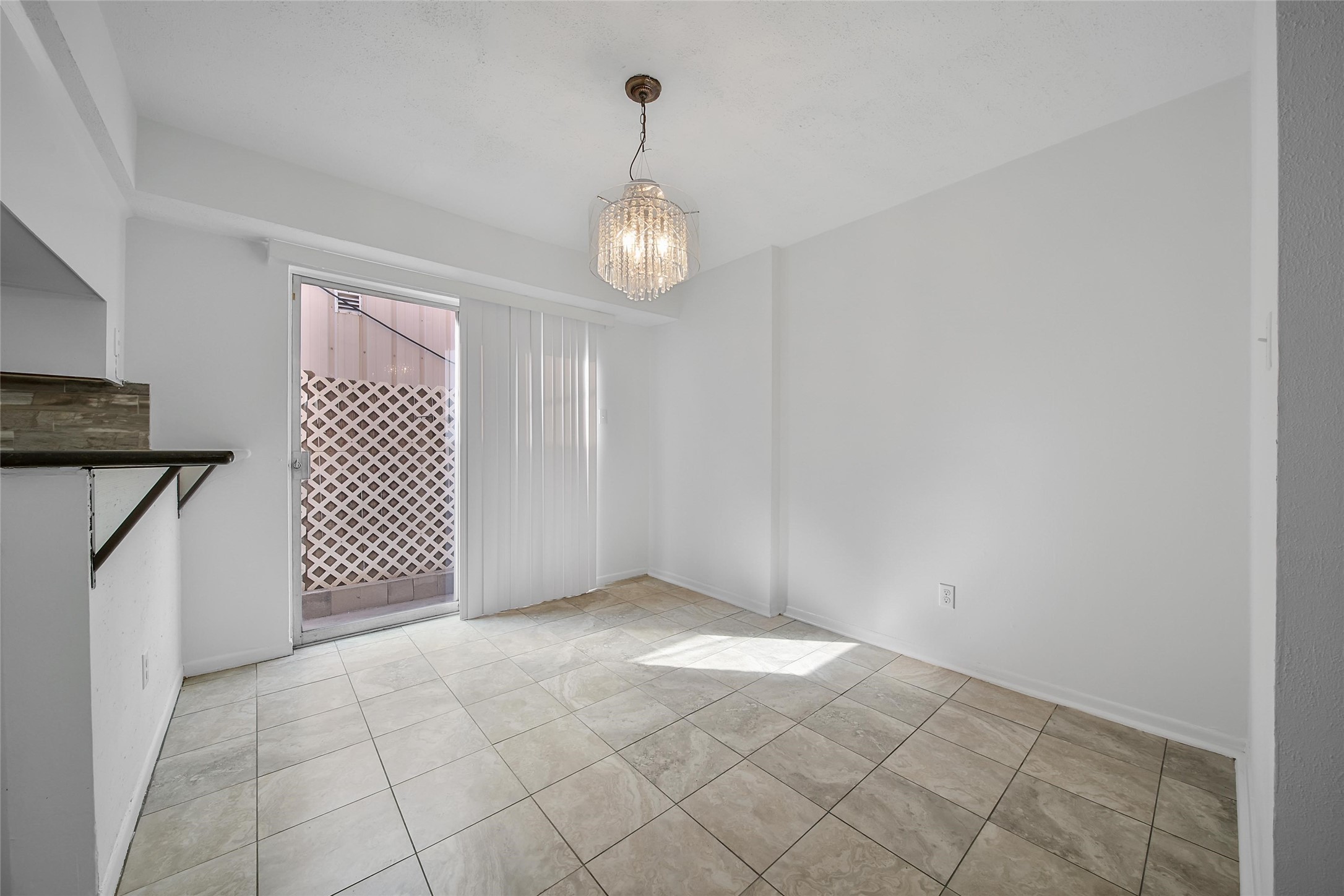 1403 Blalock Road, Unit 15 Houston, TX 77055 - Photo 7 of 21 a view of a livingroom with chandelier fan and windows