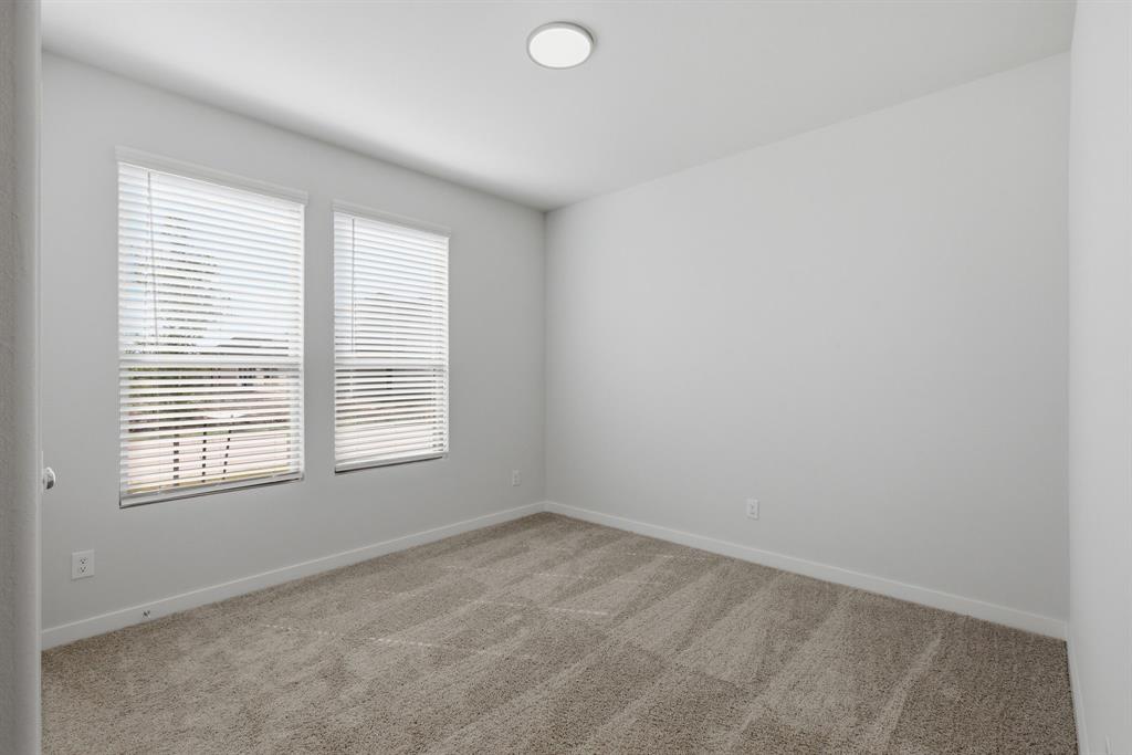 637 Sierra Ridge Lavon, TX 75166 - Photo 10 of 26 an empty room with a window