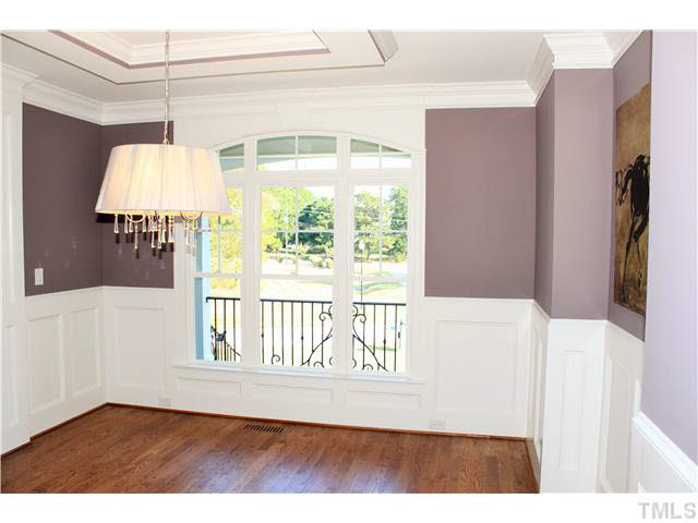 2613 Packhouse Road Zebulon, NC 27597 - Photo 14 of 25 Once again incredible attention to detail wanes coating elegant light fixture unique tray ceiling triple window with elliptical transom and custom interior molding.