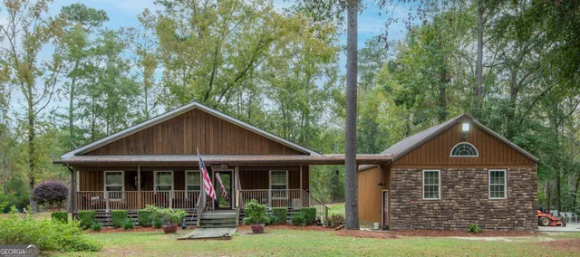 a front view of a house with yard