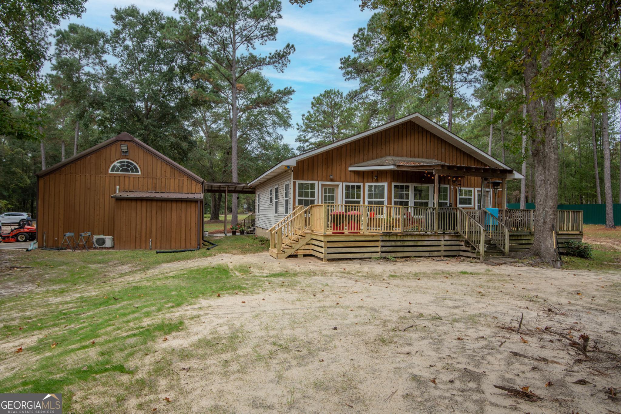363 Dover Road Sylvania, GA 30467 - Photo 17 of 27 a view of a house with a yard
