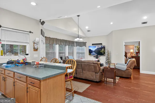 a view of a livingroom with furniture and window