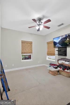 a very nice looking room with a flat screen tv