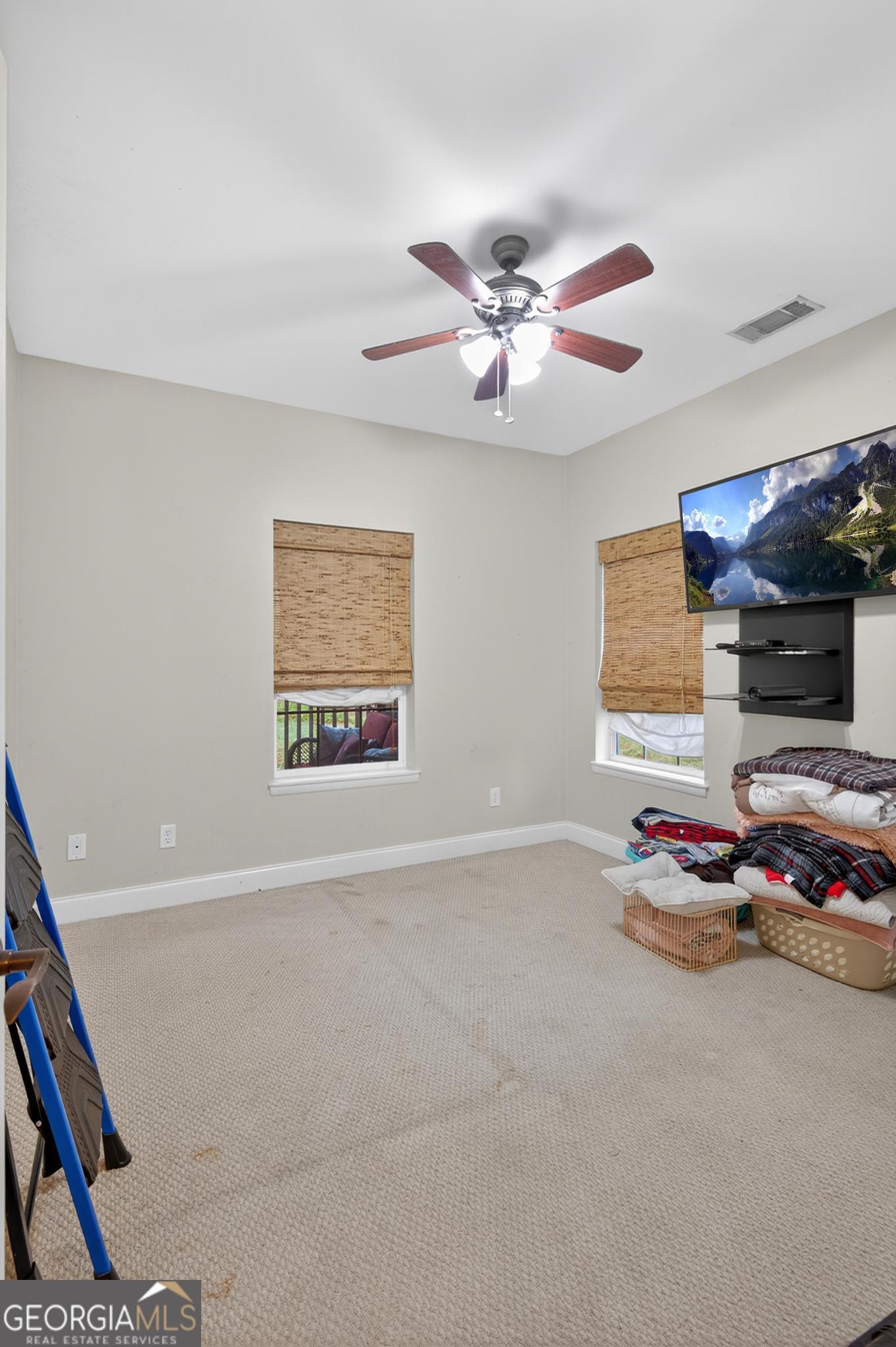 363 Dover Road Sylvania, GA 30467 - Photo 6 of 27 a very nice looking room with a flat screen tv