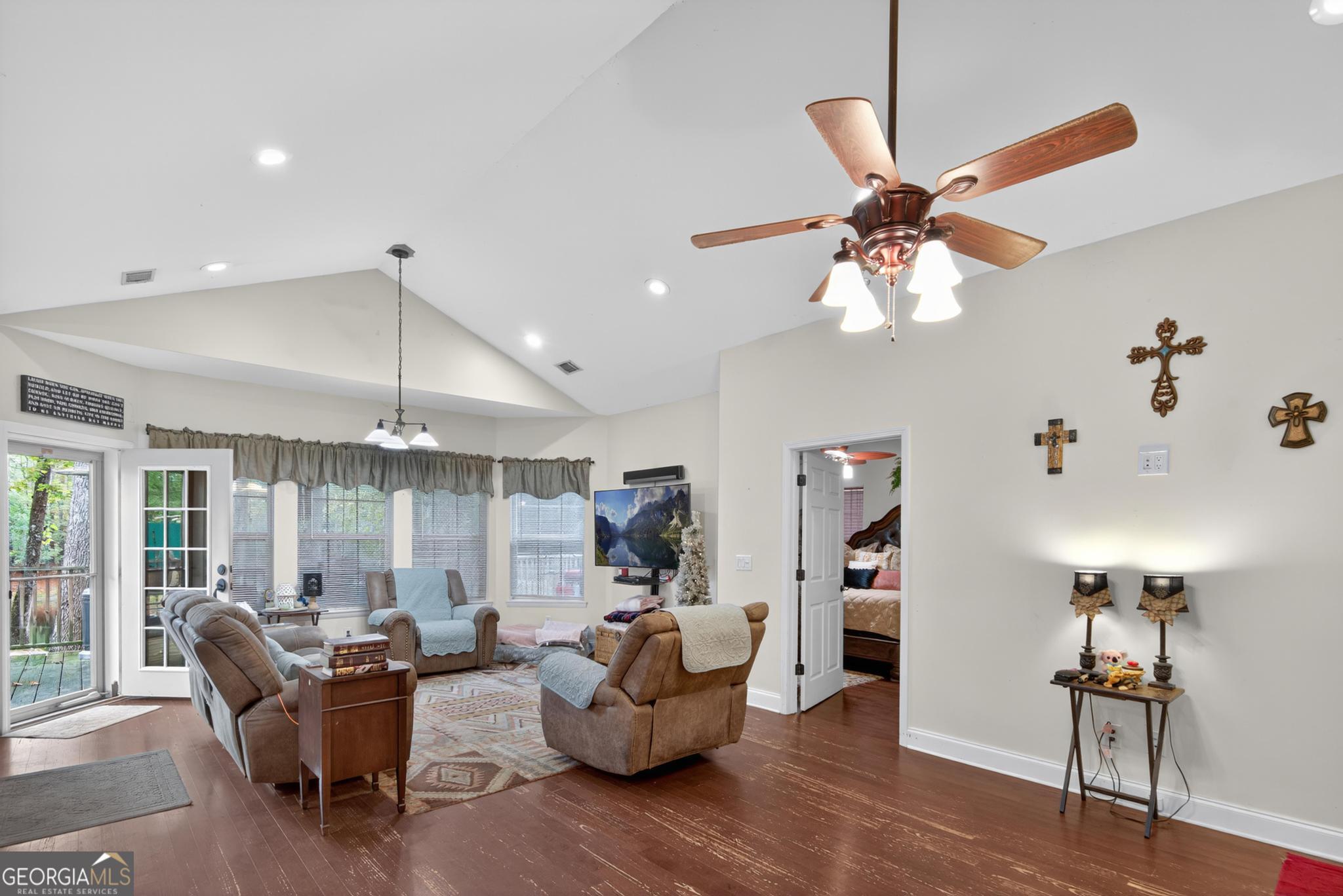 363 Dover Road Sylvania, GA 30467 - Photo 9 of 27 a living room with furniture and a chandelier