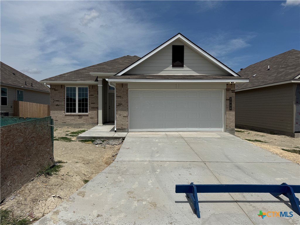 2008 Filmore Cove Temple, TX 76504 - Photo 1 of 1 a front view of a house with a yard