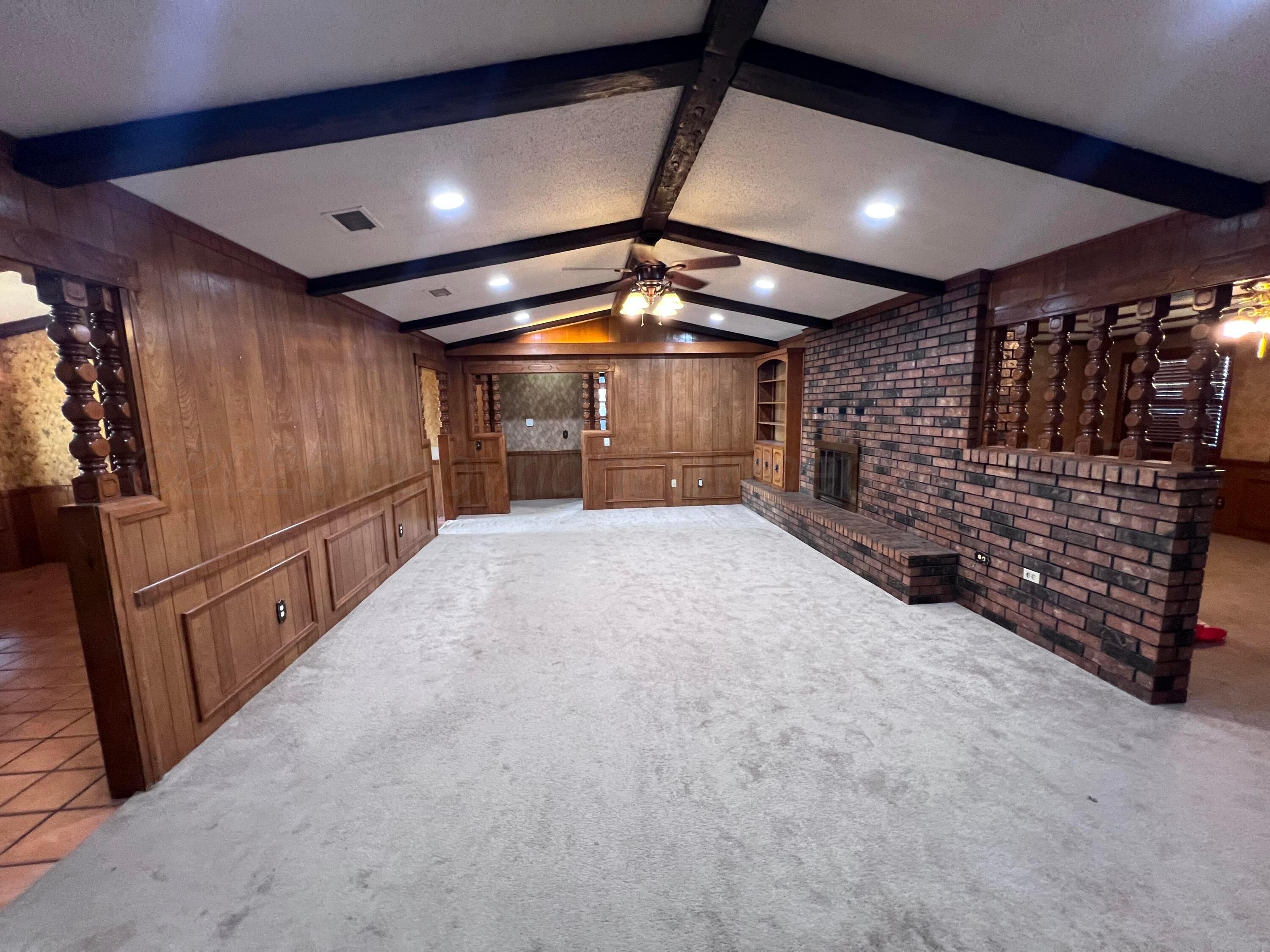 807 North Arrah Friona, TX 79035 - Photo 15 of 56 a view of empty room with wooden ceiling