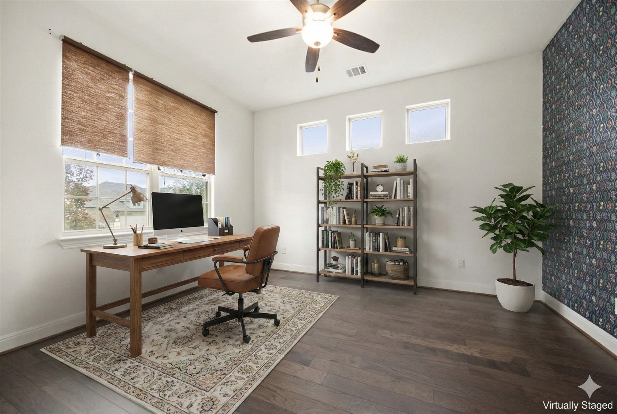 1098 Cherrystone Loop Buda, TX 78610 - Photo 4 of 37 a workspace with furniture and a potted plant