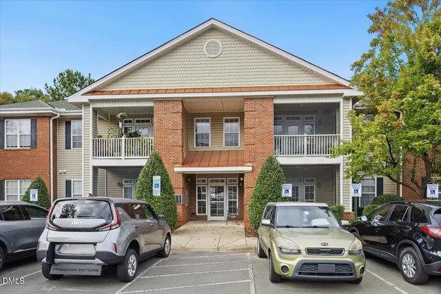 a car parked in front of a house