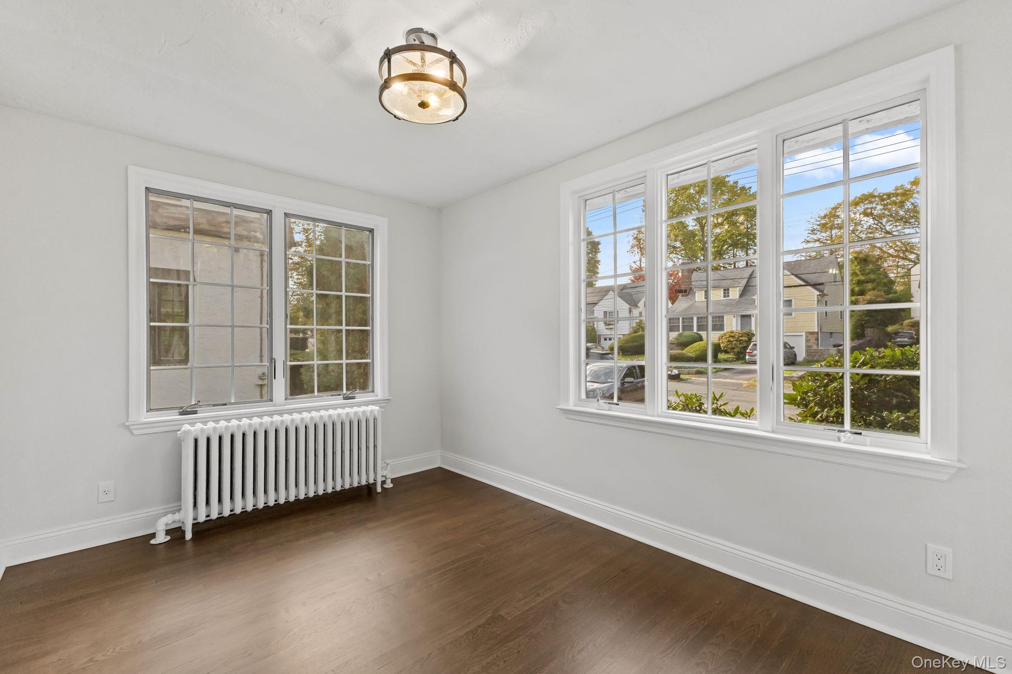 202 East Garden Road Larchmont, NY 10538 - Photo 17 of 35 an empty room with a window