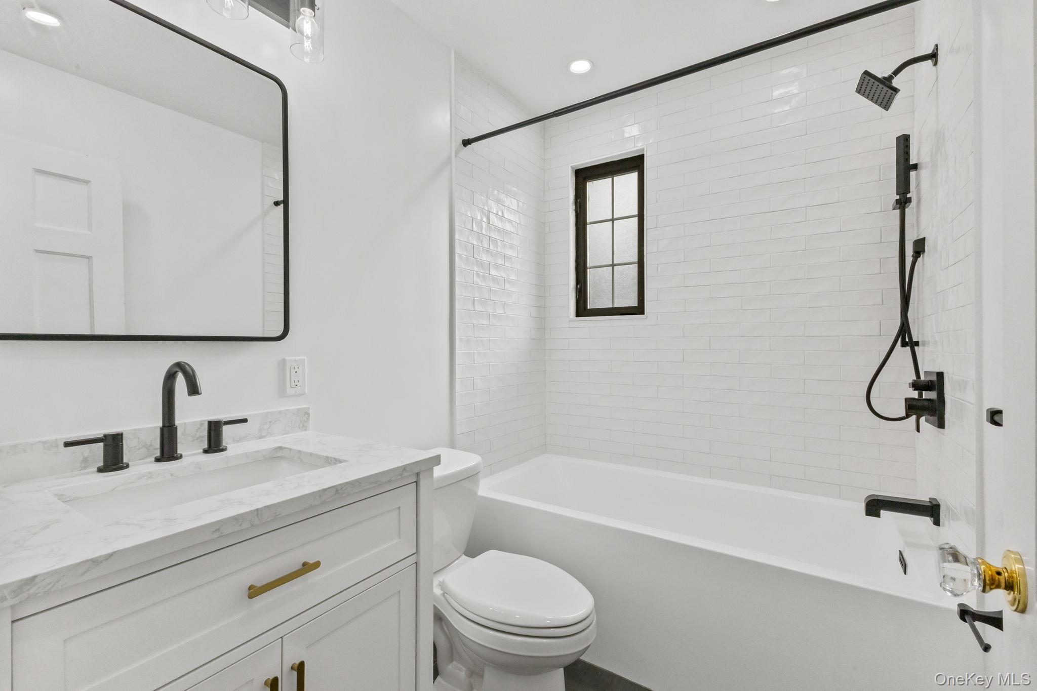 202 East Garden Road Larchmont, NY 10538 - Photo 18 of 35 a bathroom with a sink a toilet and a bathtub