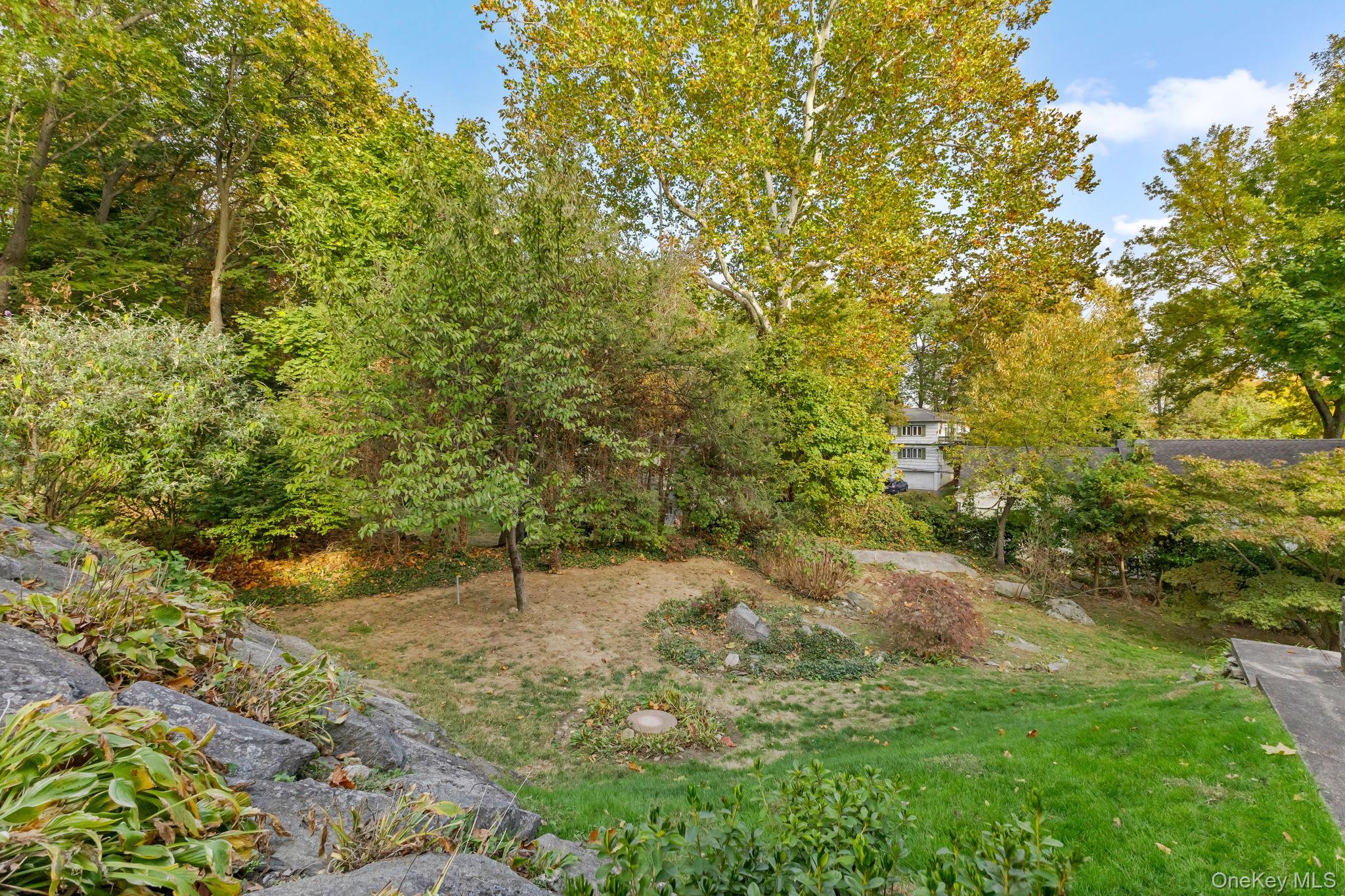 202 East Garden Road Larchmont, NY 10538 - Photo 31 of 35 a view of a pathway with a tree