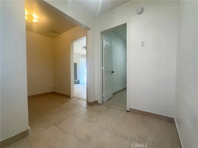 an empty room with a bathroom