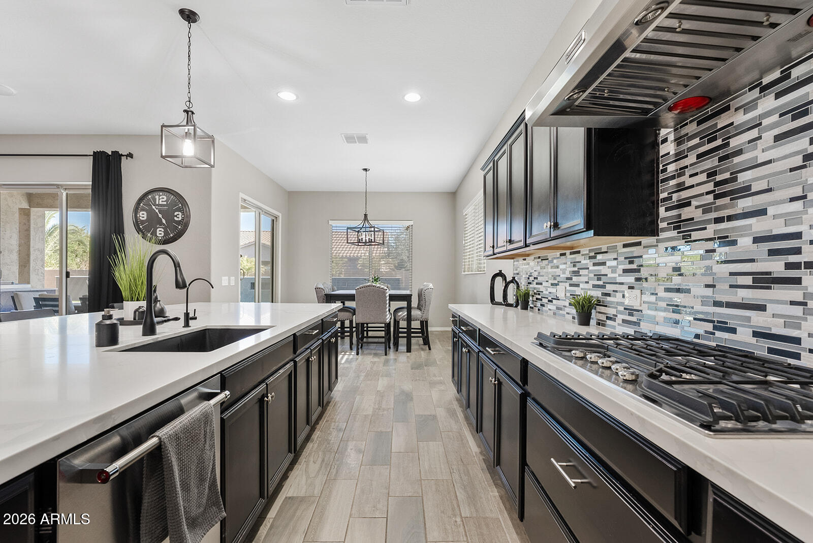 19411 East Timberline Road Queen Creek, AZ 85142 - Photo 17 of 44 a kitchen with sink stove and cabinets