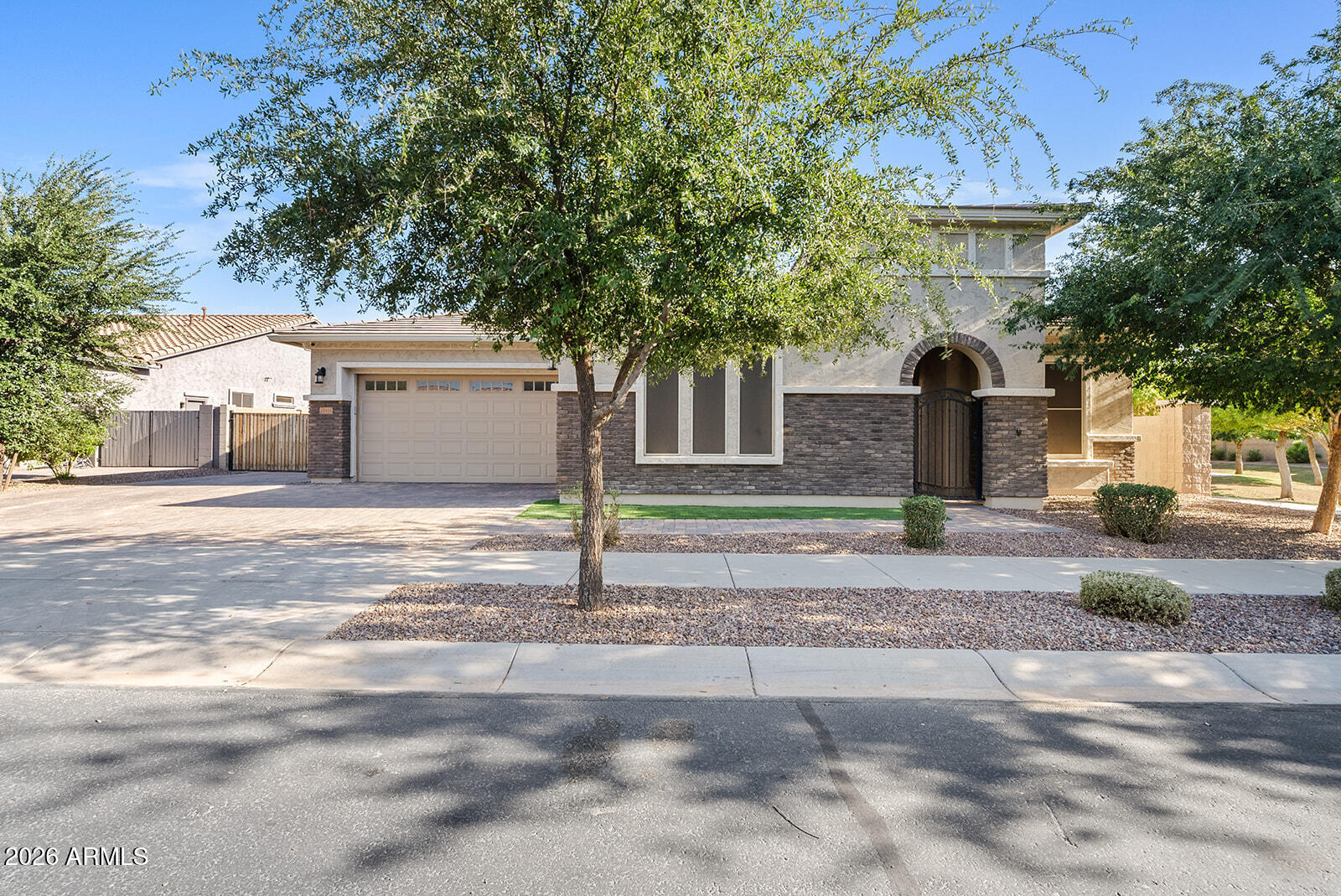 19411 East Timberline Road Queen Creek, AZ 85142 - Photo 2 of 44 a house with a tree in front of it