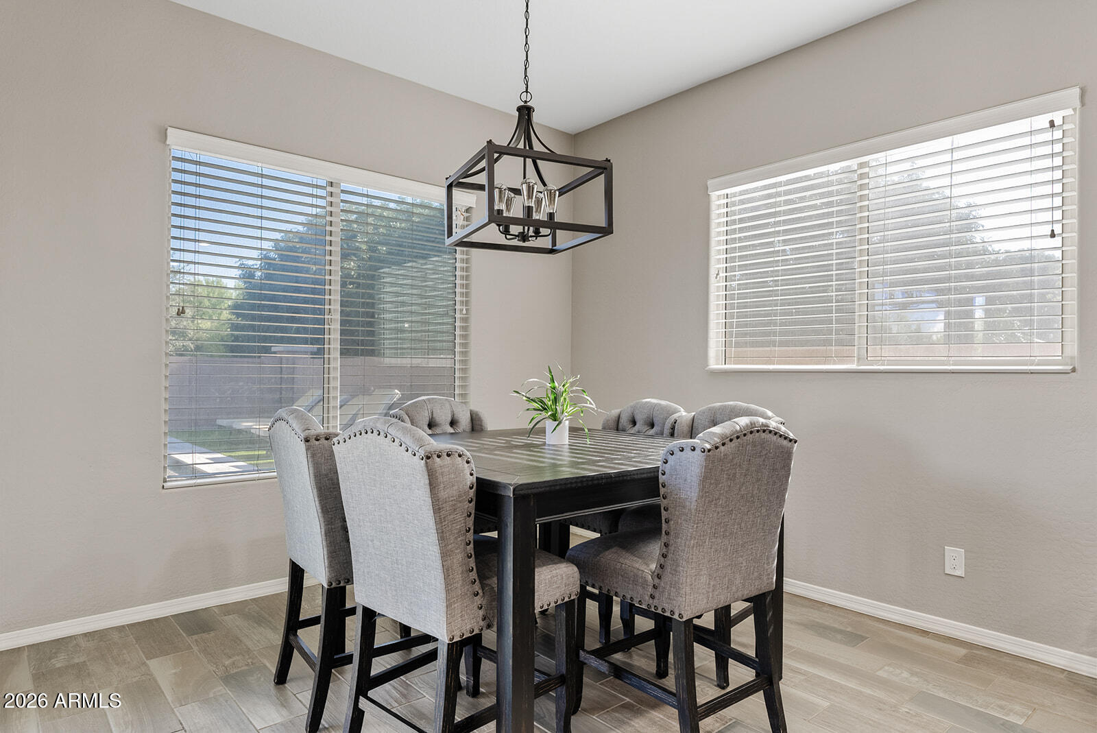 19411 East Timberline Road Queen Creek, AZ 85142 - Photo 21 of 44 a view of a dining room with furniture window and outside view