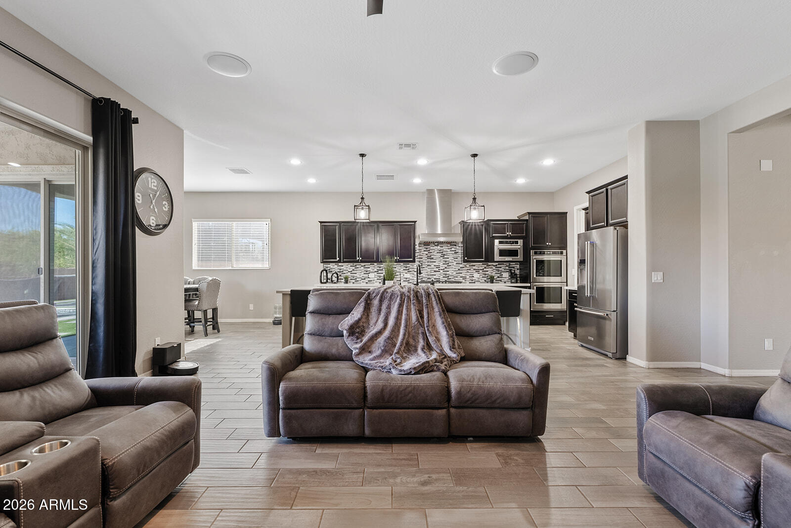 19411 East Timberline Road Queen Creek, AZ 85142 - Photo 37 of 44 a living room with furniture and a view of kitchen