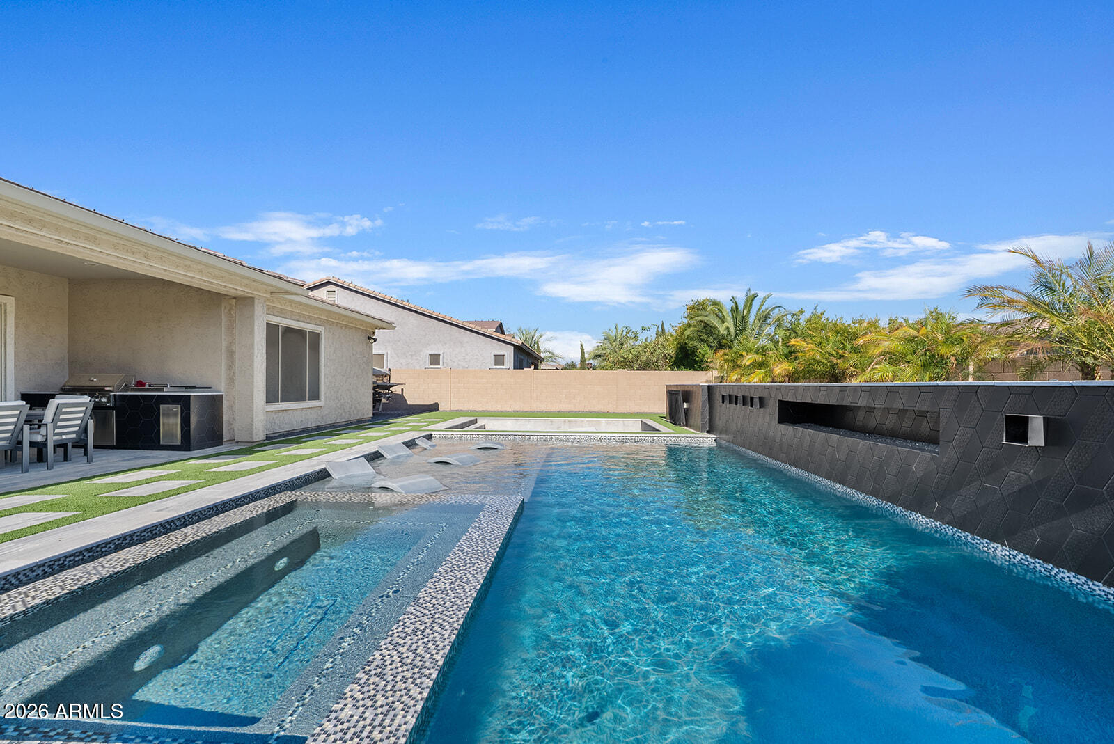 19411 East Timberline Road Queen Creek, AZ 85142 - Photo 41 of 44 a view of an outdoor space with a swimming pool