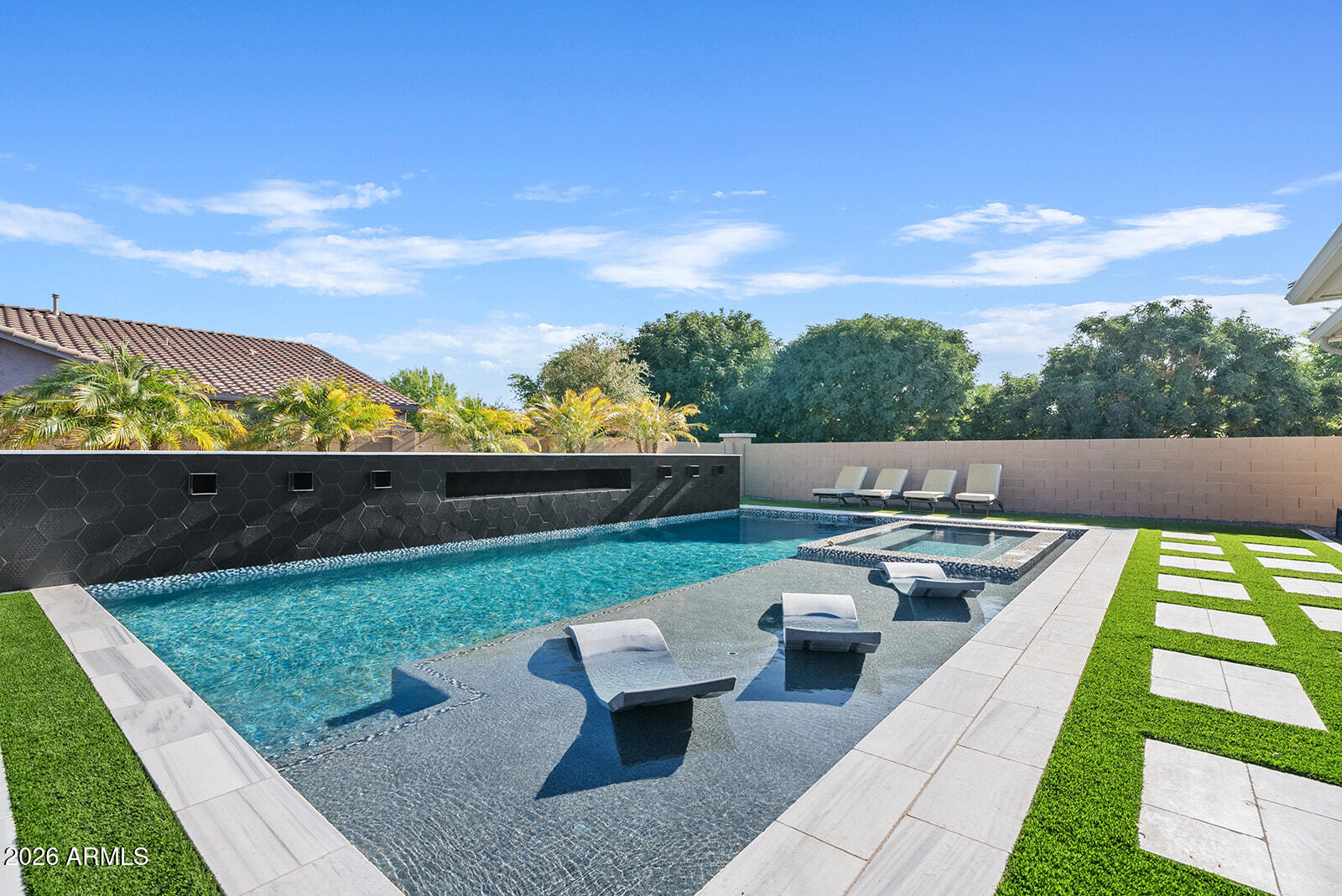 19411 East Timberline Road Queen Creek, AZ 85142 - Photo 42 of 44 swimming pool view with a garden space