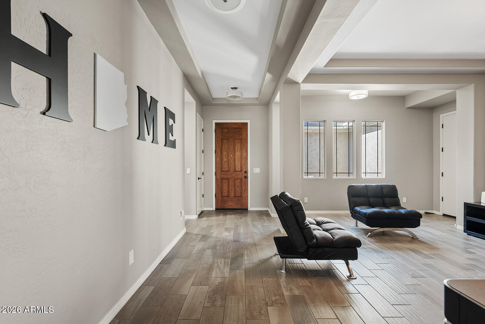 19411 East Timberline Road Queen Creek, AZ 85142 - Photo 5 of 44 a living room with furniture and a couch