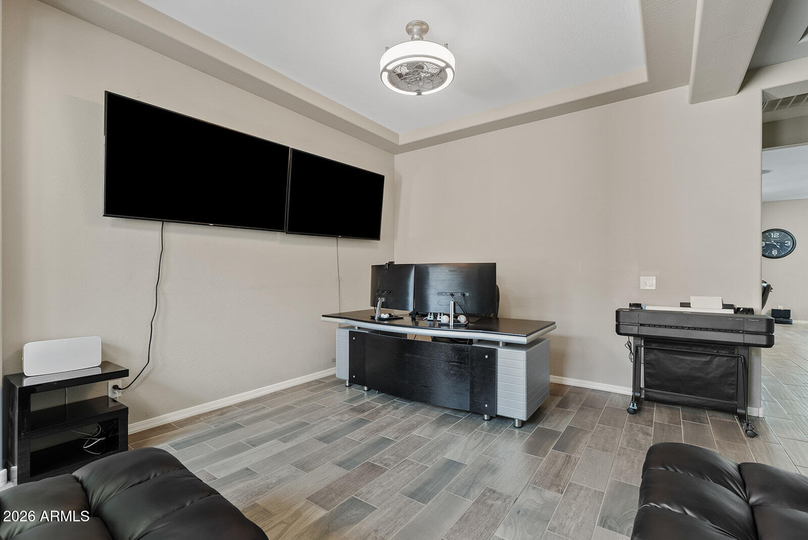 19411 East Timberline Road Queen Creek, AZ 85142 - Photo 7 of 44 a view of a livingroom with furniture and a flat screen tv