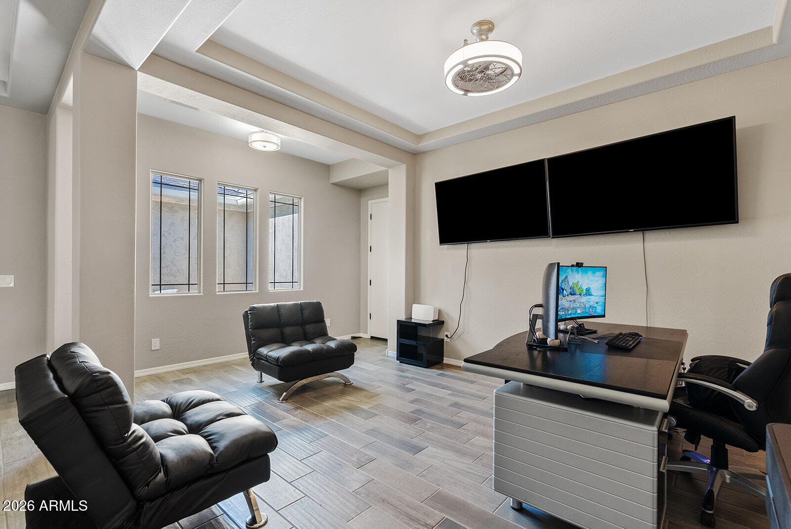 19411 East Timberline Road Queen Creek, AZ 85142 - Photo 8 of 44 a living room with furniture and a flat screen tv