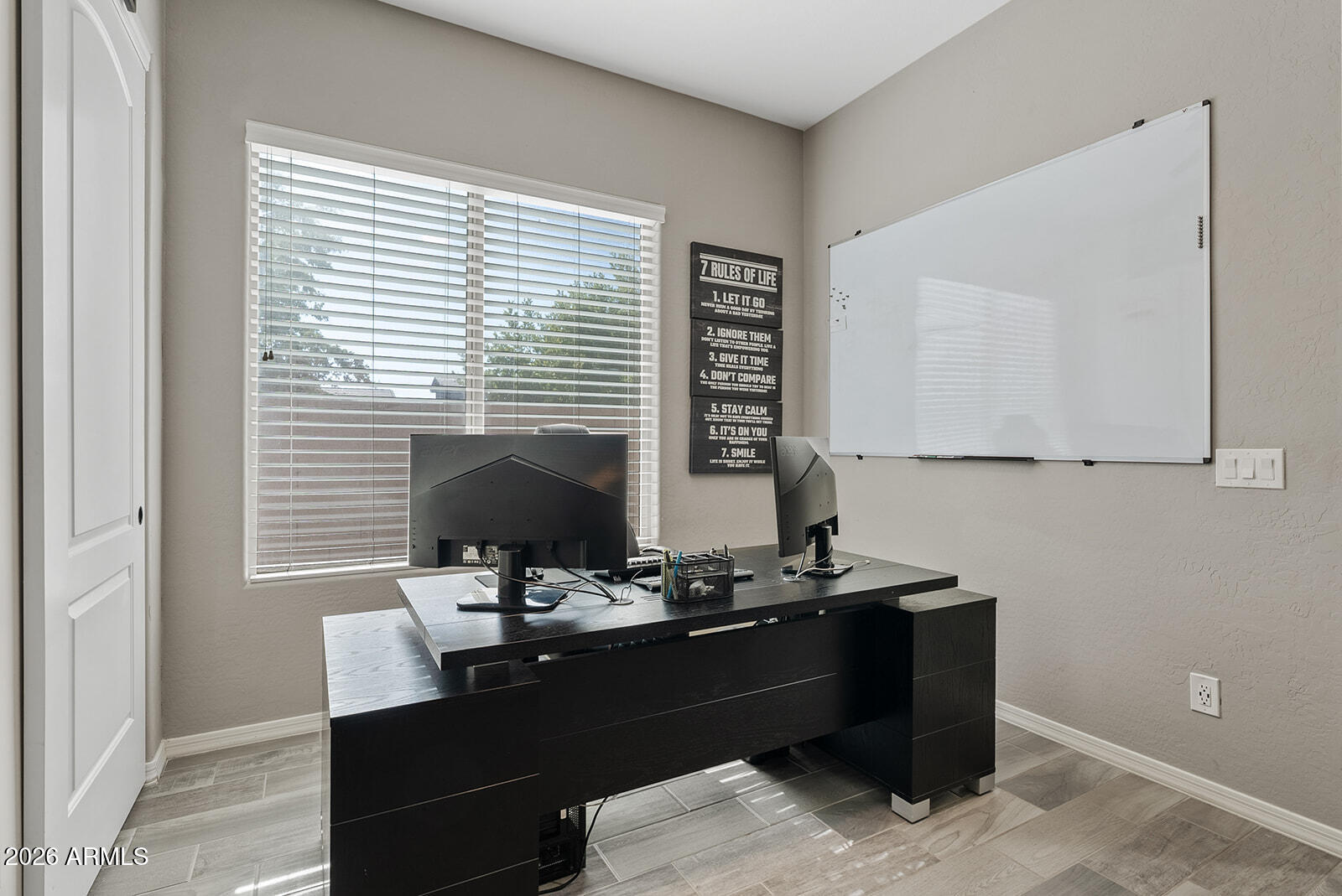 19411 East Timberline Road Queen Creek, AZ 85142 - Photo 10 of 44 a room with a table chairs and a window