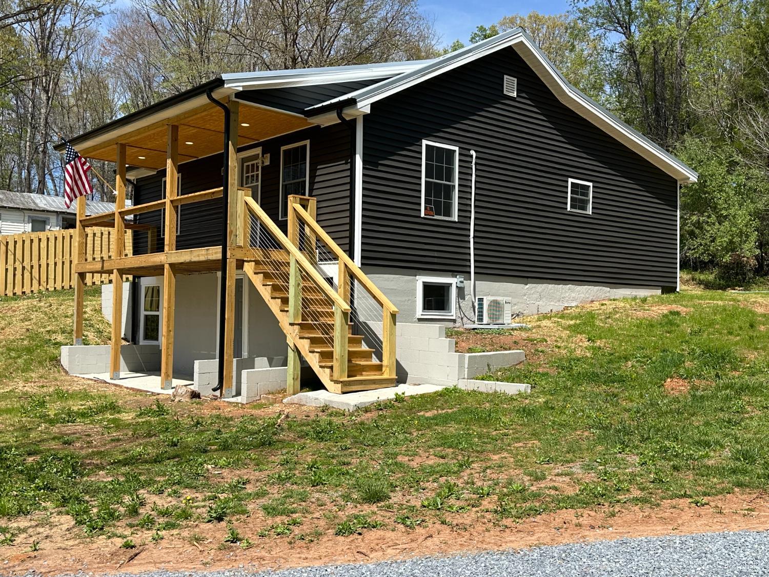 1221 Lynch Road Altavista, VA 24517 - Photo 14 of 14 a view of a house with wooden fence