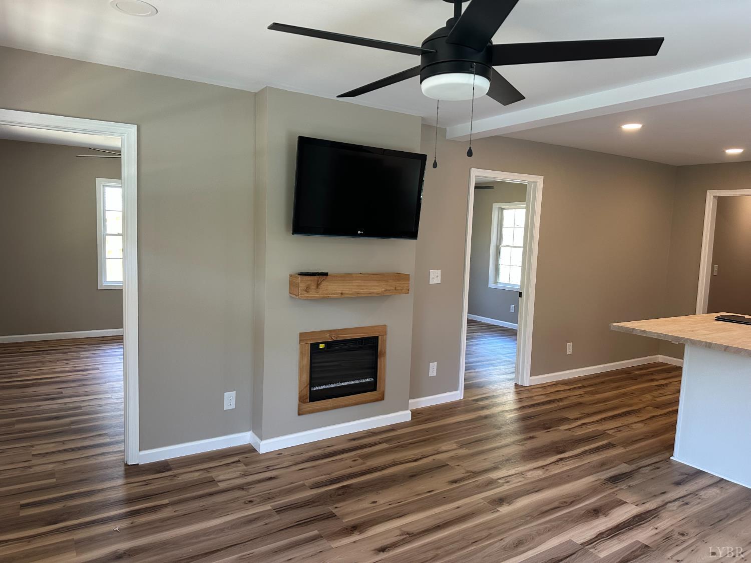 1221 Lynch Road Altavista, VA 24517 - Photo 2 of 14 a living room with furniture and a flat screen tv