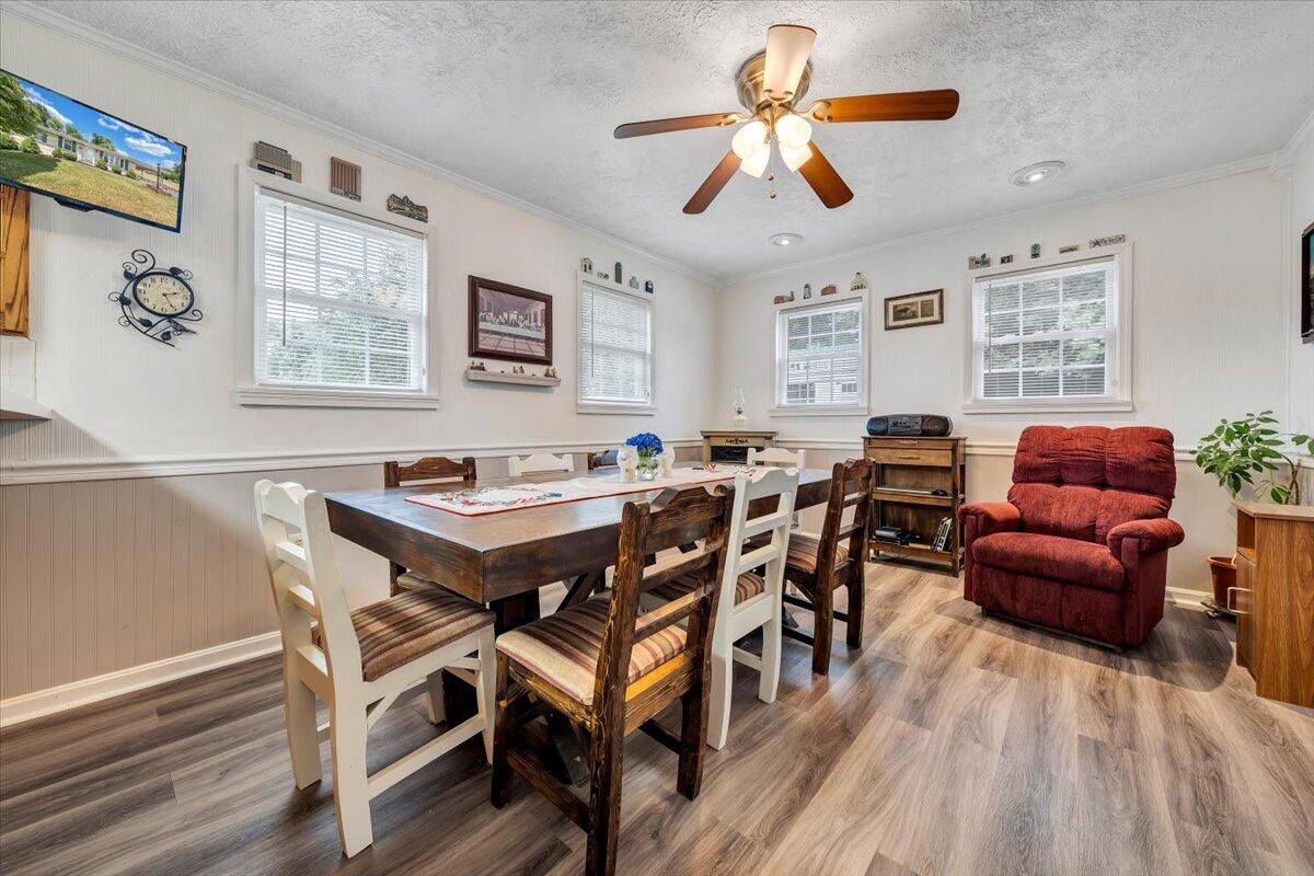 501 Olney Road Vinton, VA 24179 - Photo 14 of 49 a view of a dining room with furniture window and wooden floor