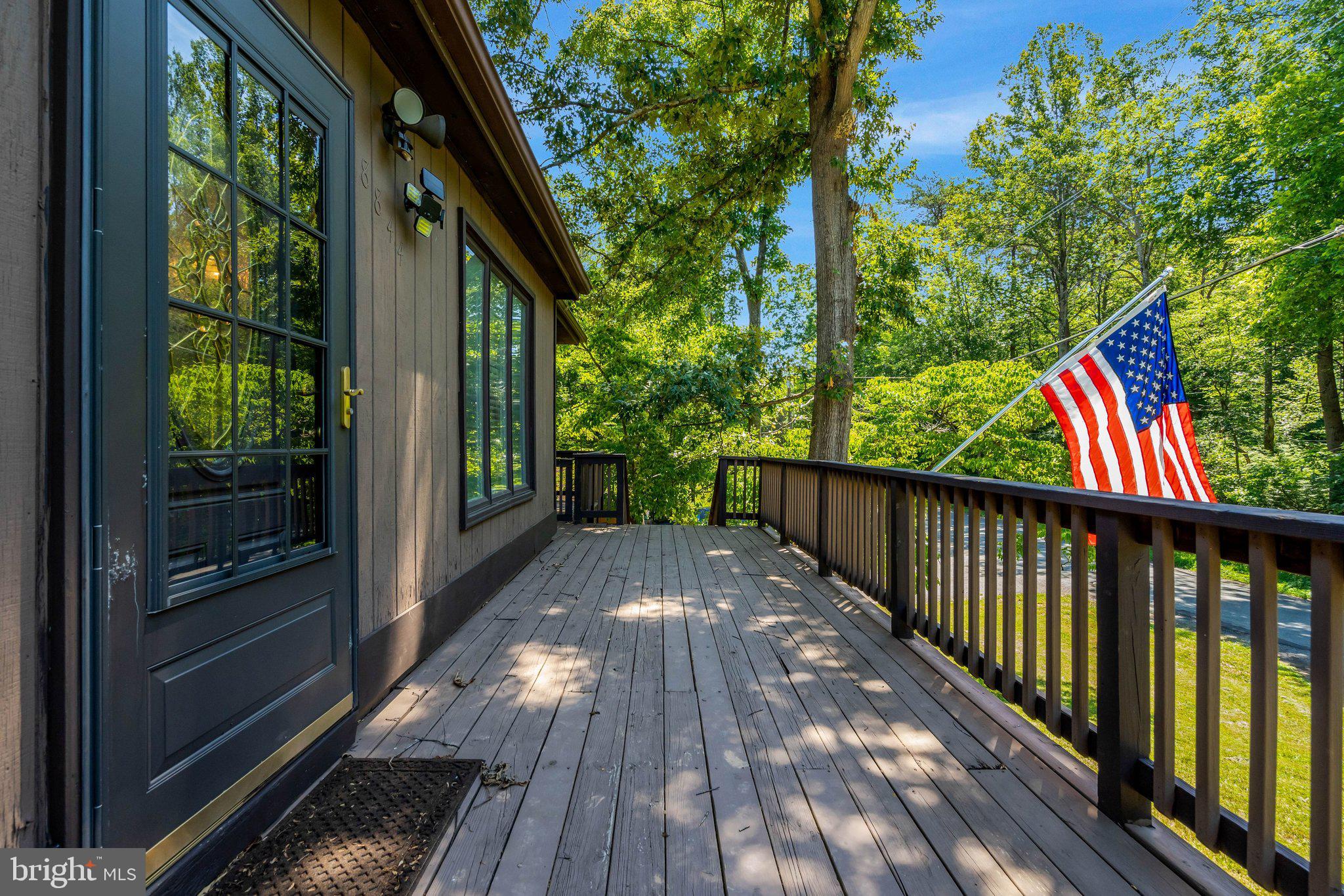 8844 McGrath Road Manassas, VA 20112 - Photo 1 of 27 Charming deck with a patriotic view.