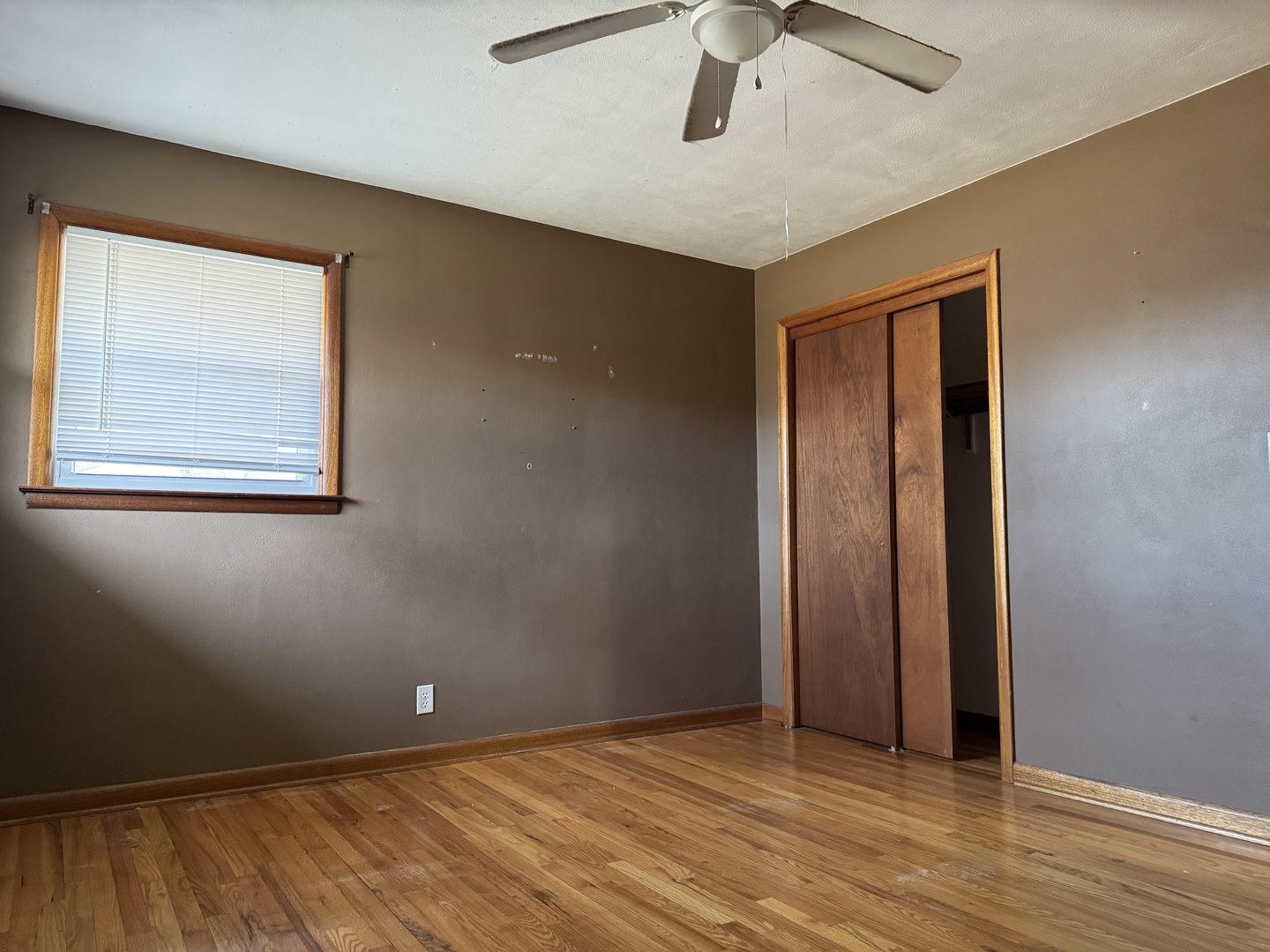 1988 South Bend Road Rockford, IL 61109 - Photo 12 of 26 an empty room with wooden floor closet and windows