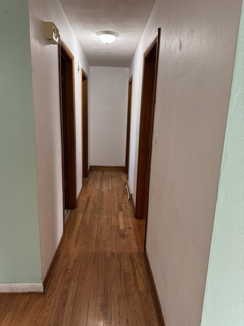 1988 South Bend Road Rockford, IL 61109 - Photo 14 of 26 a view of hallway with wooden floor