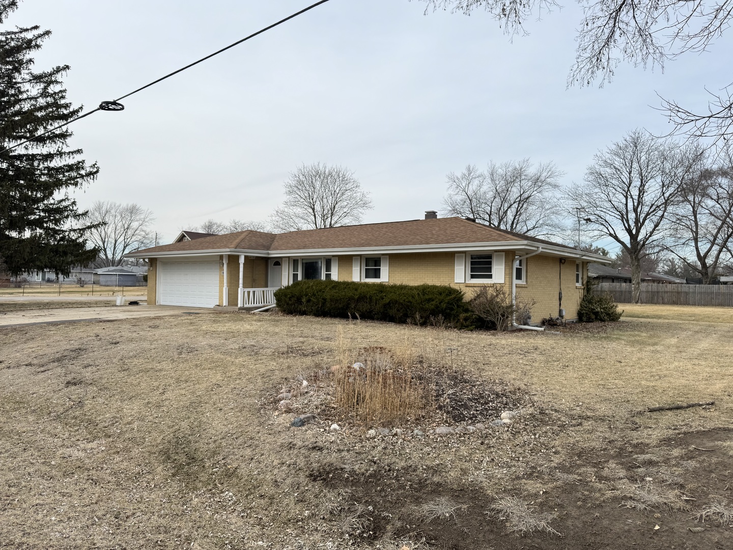 1988 South Bend Road Rockford, IL 61109 - Photo 23 of 26 a front view of a house with a yard and garage