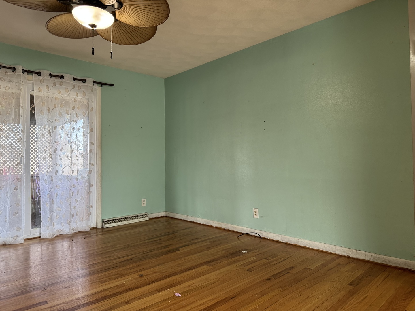 1988 South Bend Road Rockford, IL 61109 - Photo 8 of 26 an empty room with wooden floor and windows