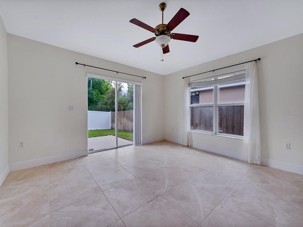 2111 Corner Point Court Orlando, FL 32820 - Photo 5 of 16 a view of an empty room with a window