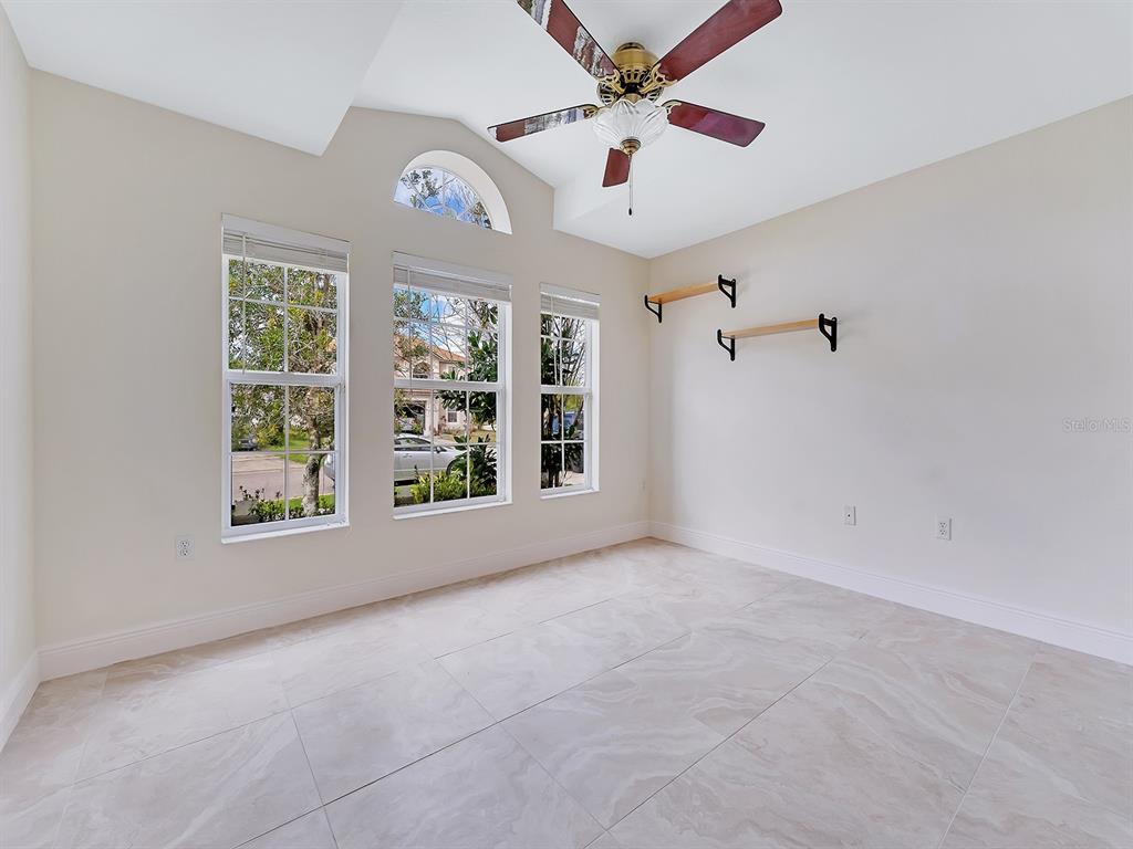 2111 Corner Point Court Orlando, FL 32820 - Photo 8 of 16 a view of an empty room with a window