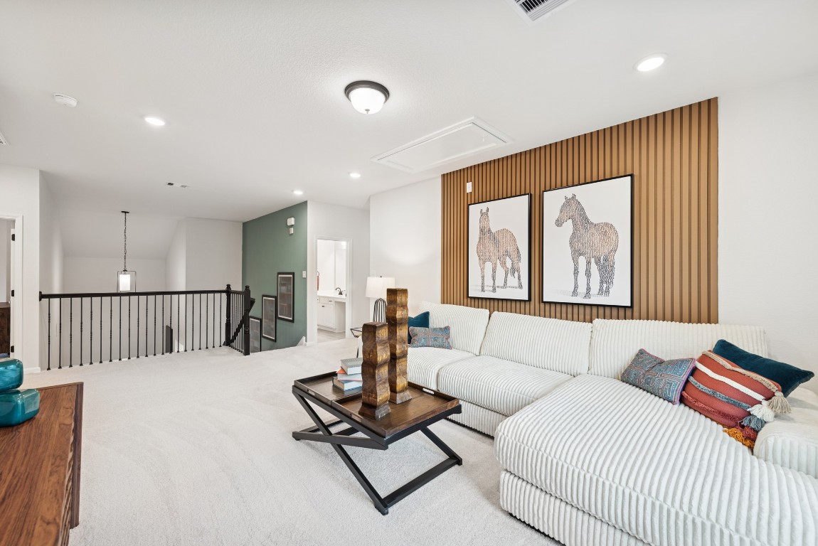 9726 Enclave Ridge Road Willis, TX 77318 - Photo 15 of 25 The Princeton II- Loft/Upstairs Game Room. Staged model home shown for illustration only; actual features, colors, and upgrades may vary.
