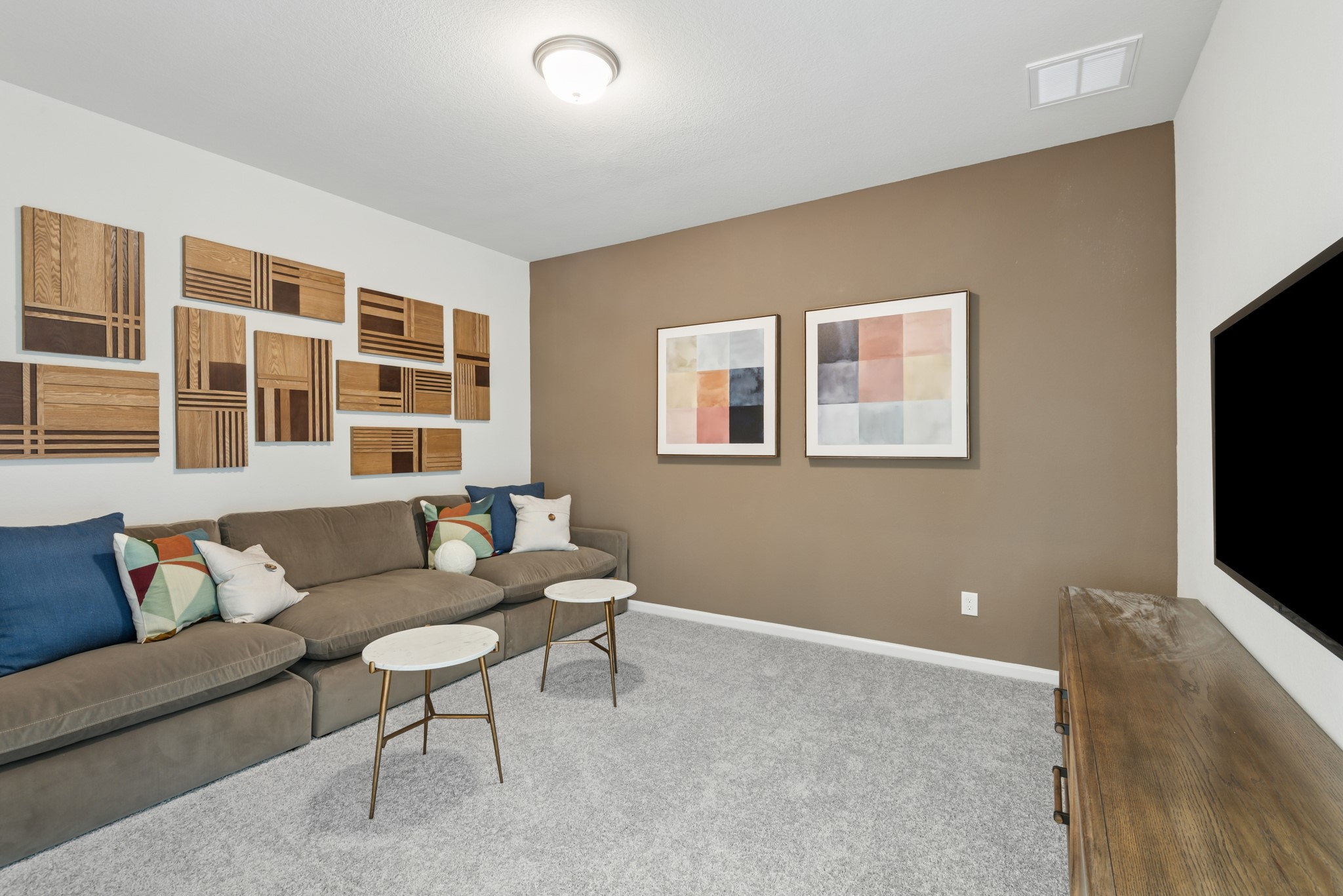 9726 Enclave Ridge Road Willis, TX 77318 - Photo 16 of 25 a living room with furniture and a flat screen tv