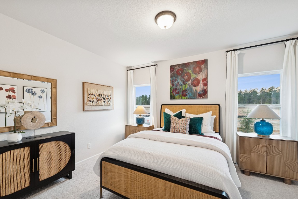 9726 Enclave Ridge Road Willis, TX 77318 - Photo 17 of 25 The Princeton II- Bedroom 2. Staged model home shown for illustration only; actual features, colors, and upgrades may vary.