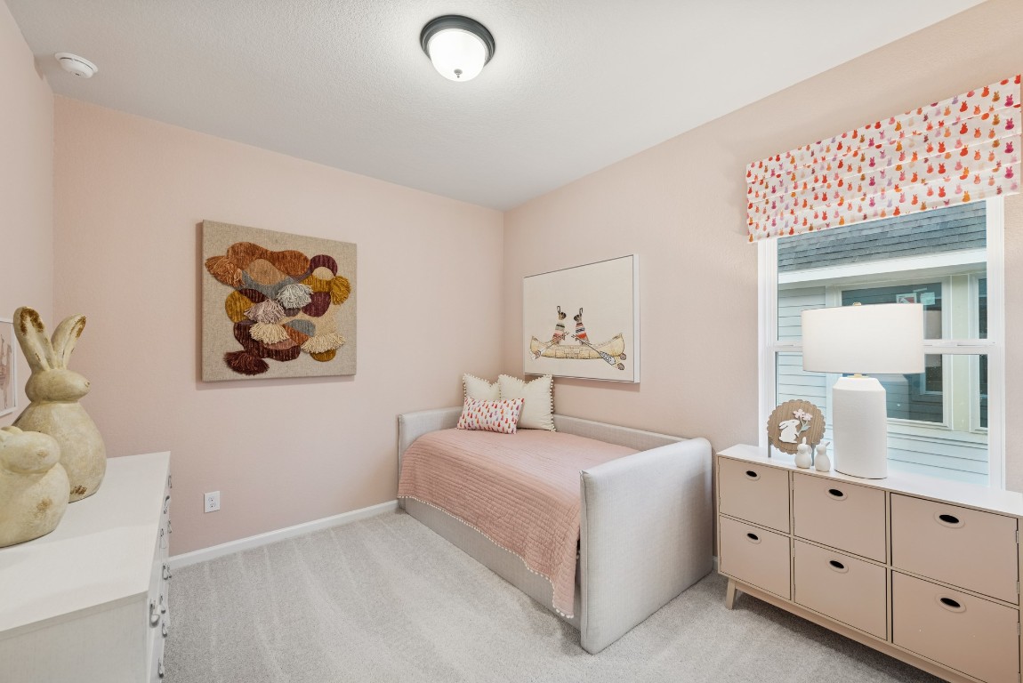 9726 Enclave Ridge Road Willis, TX 77318 - Photo 18 of 25 The Princeton II- Bedroom 3. Staged model home shown for illustration only; actual features, colors, and upgrades may vary.